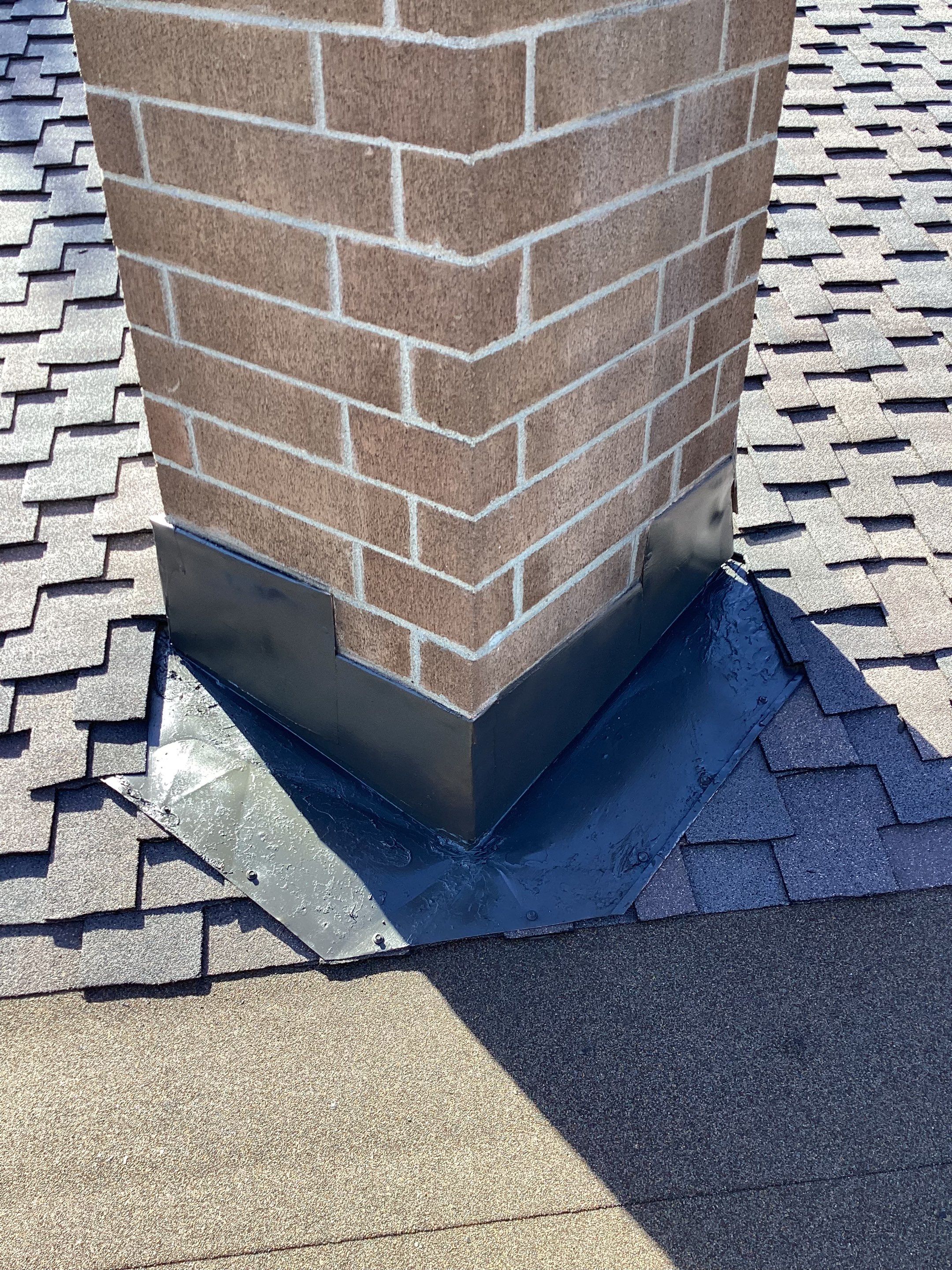 Installation of Certainteed Presidential shingles on residential house by Straight Edge Roofing Inc