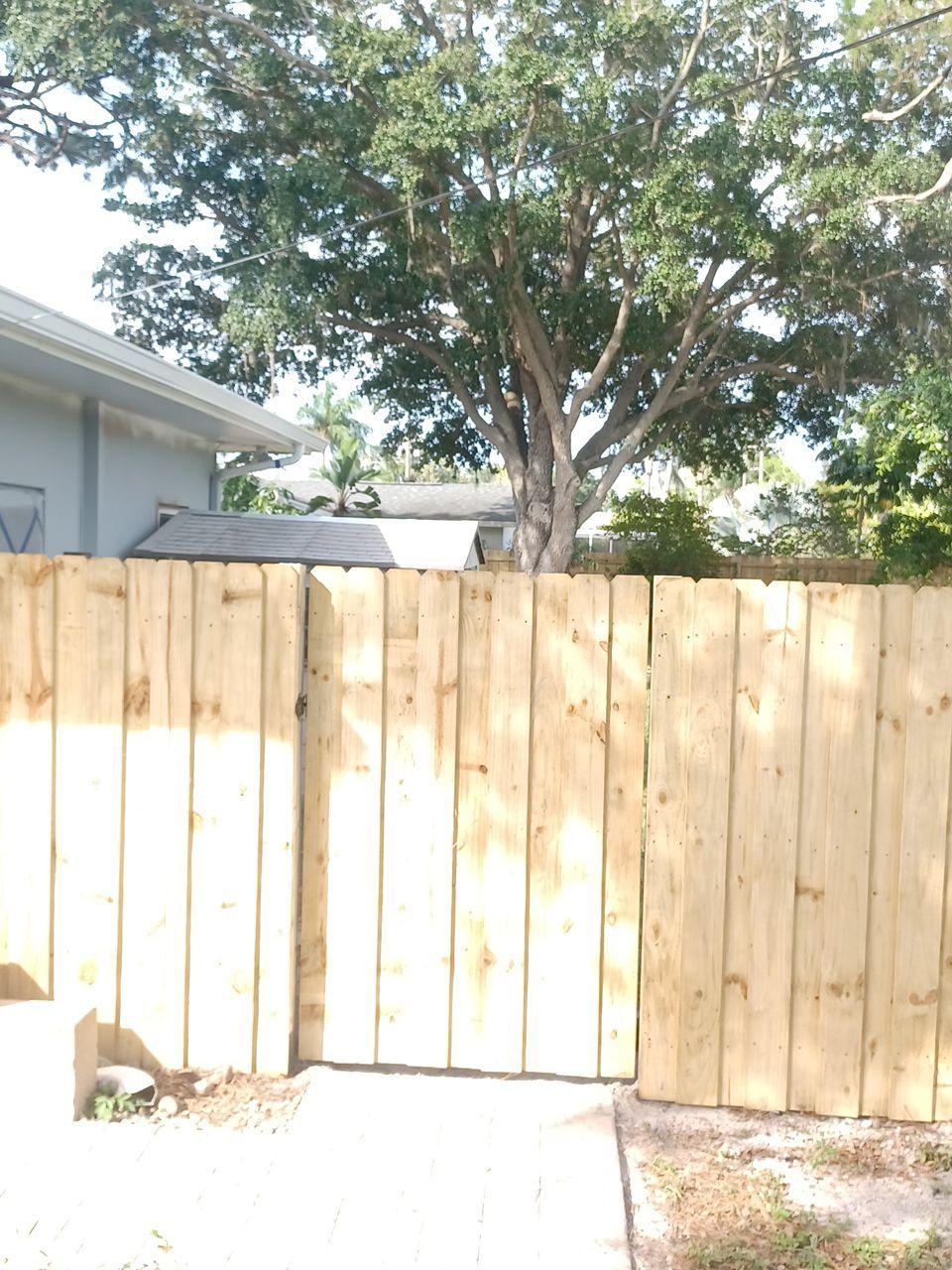 Sarasota, FL 6ft. Tall Treated Board on Board Wood Fence by Asap fence and gates, LLC