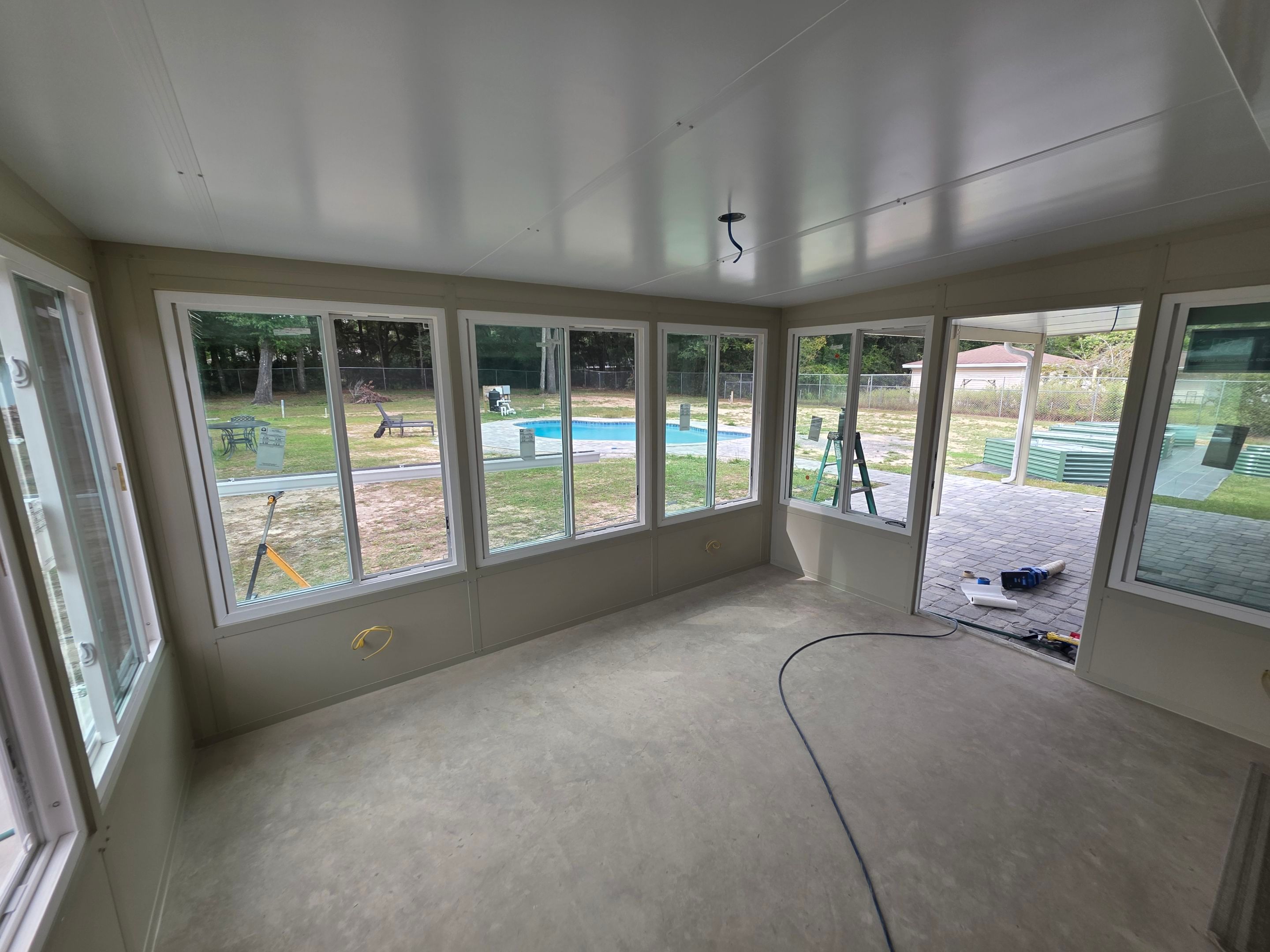 Sunroom Addition and Covered Patio by Titan Sunrooms