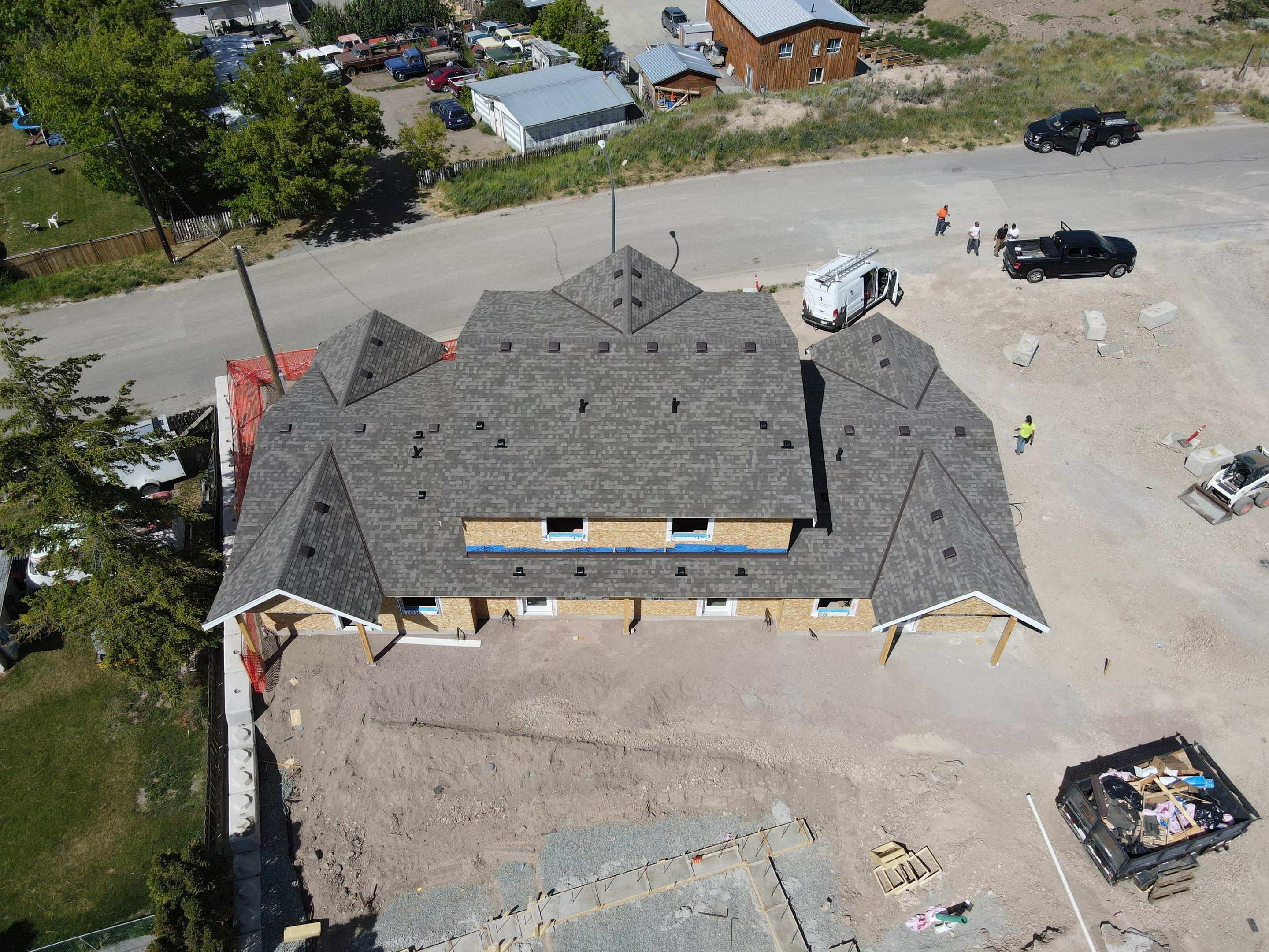 Residential Roofing Installation using OC Oakridge shingles by Top Notch Roofing Inc