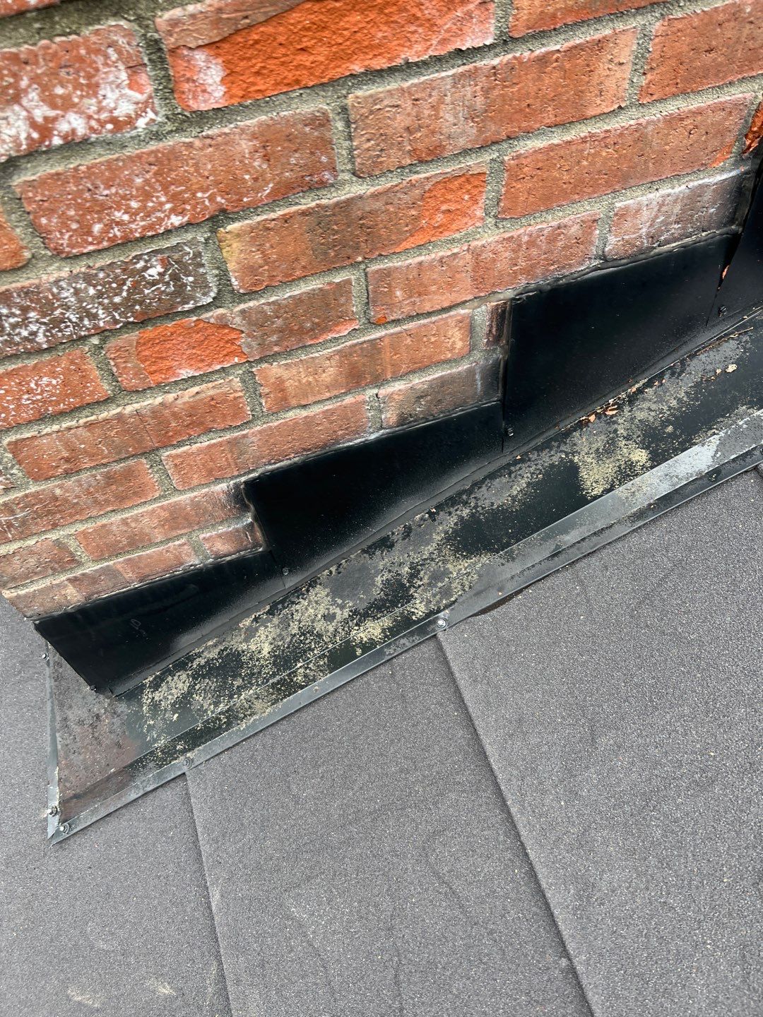 Residential Roofing Repair using Chimney counter flashing by Nitro Roofing and Construction