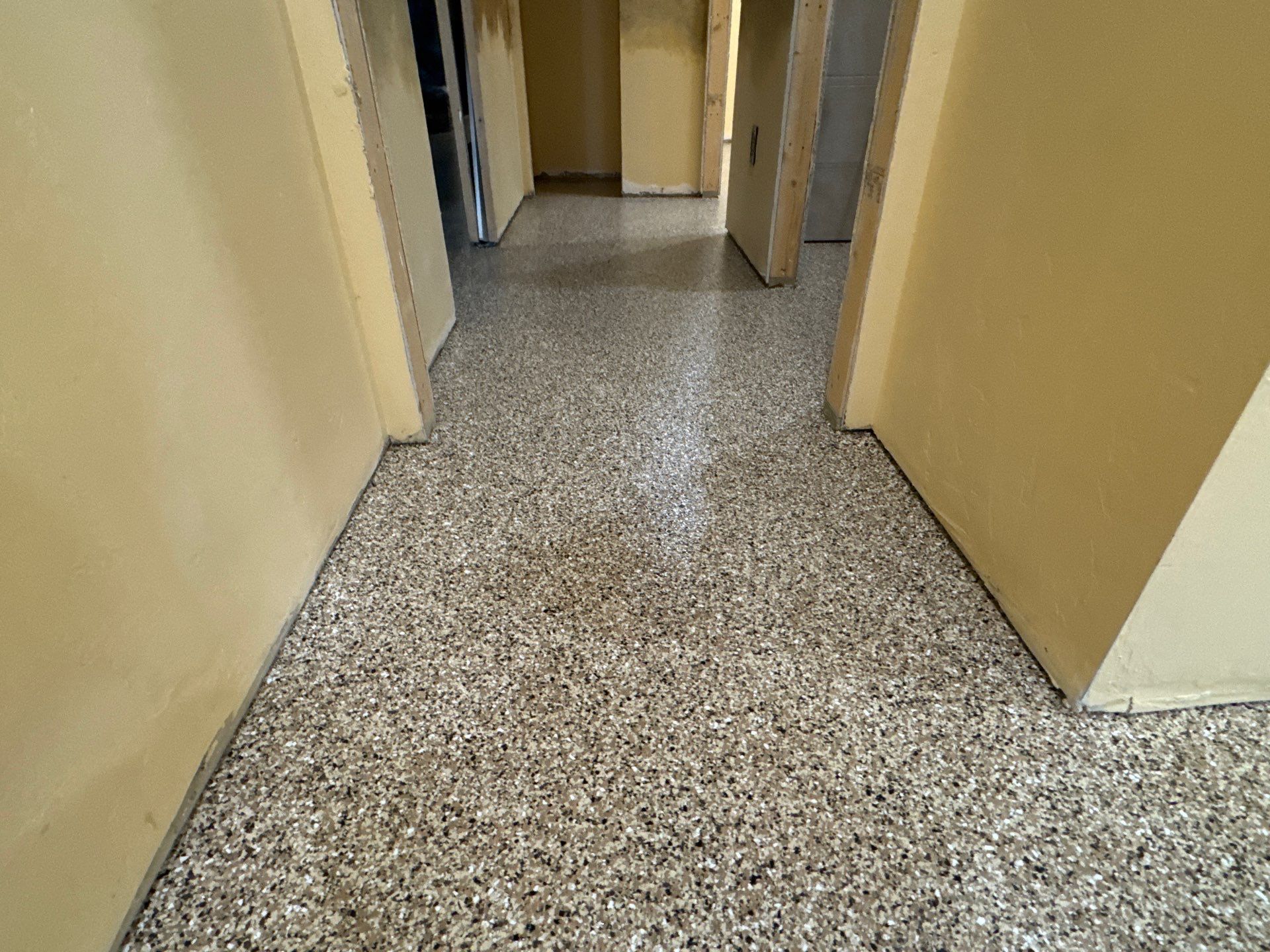 Garage and interior Project in Gainesville, FL in Sandstone by Cross Creek Concrete Coatings