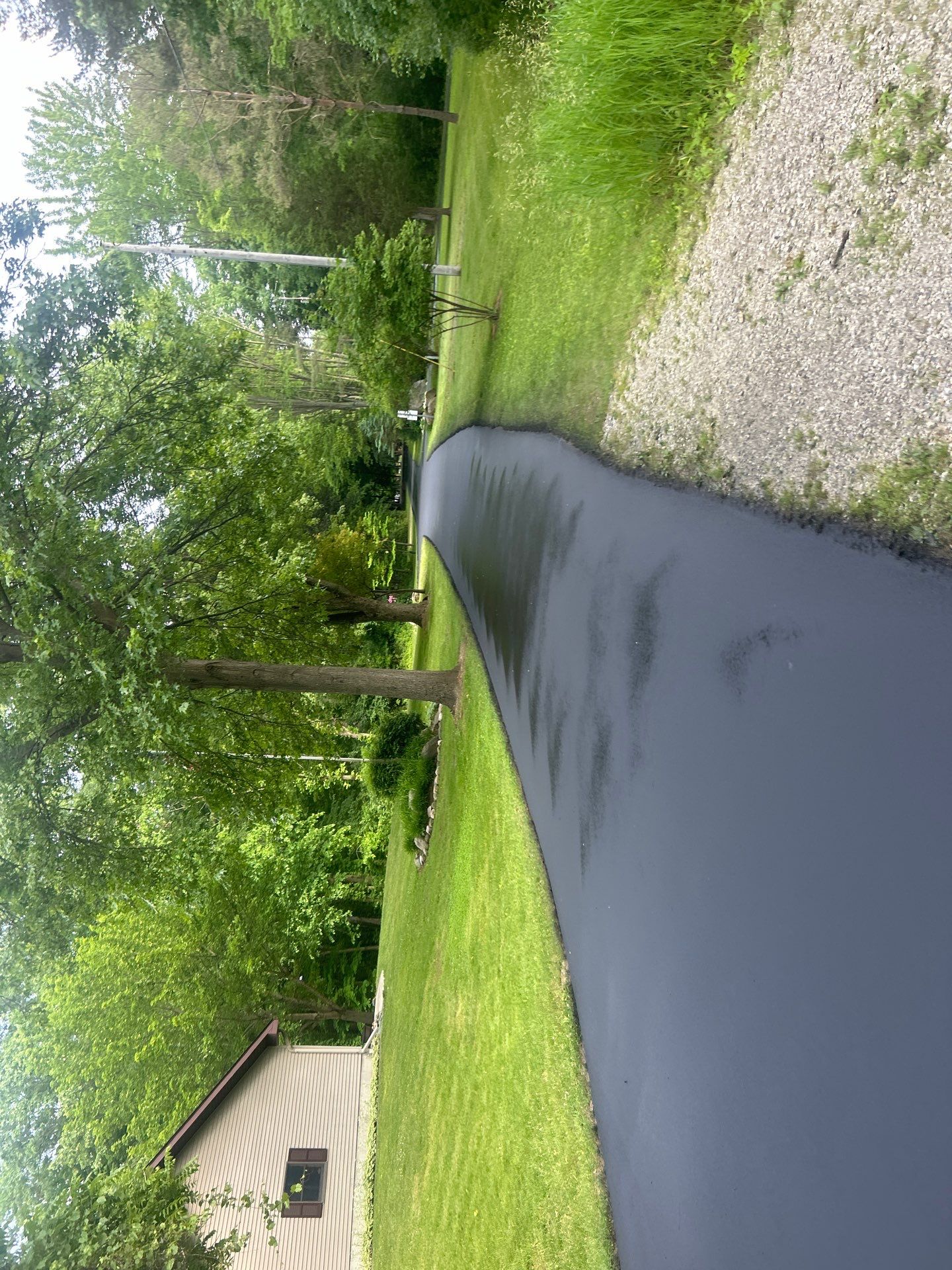 High end residential driveway by Quality Asphalt & Maintenance LLC