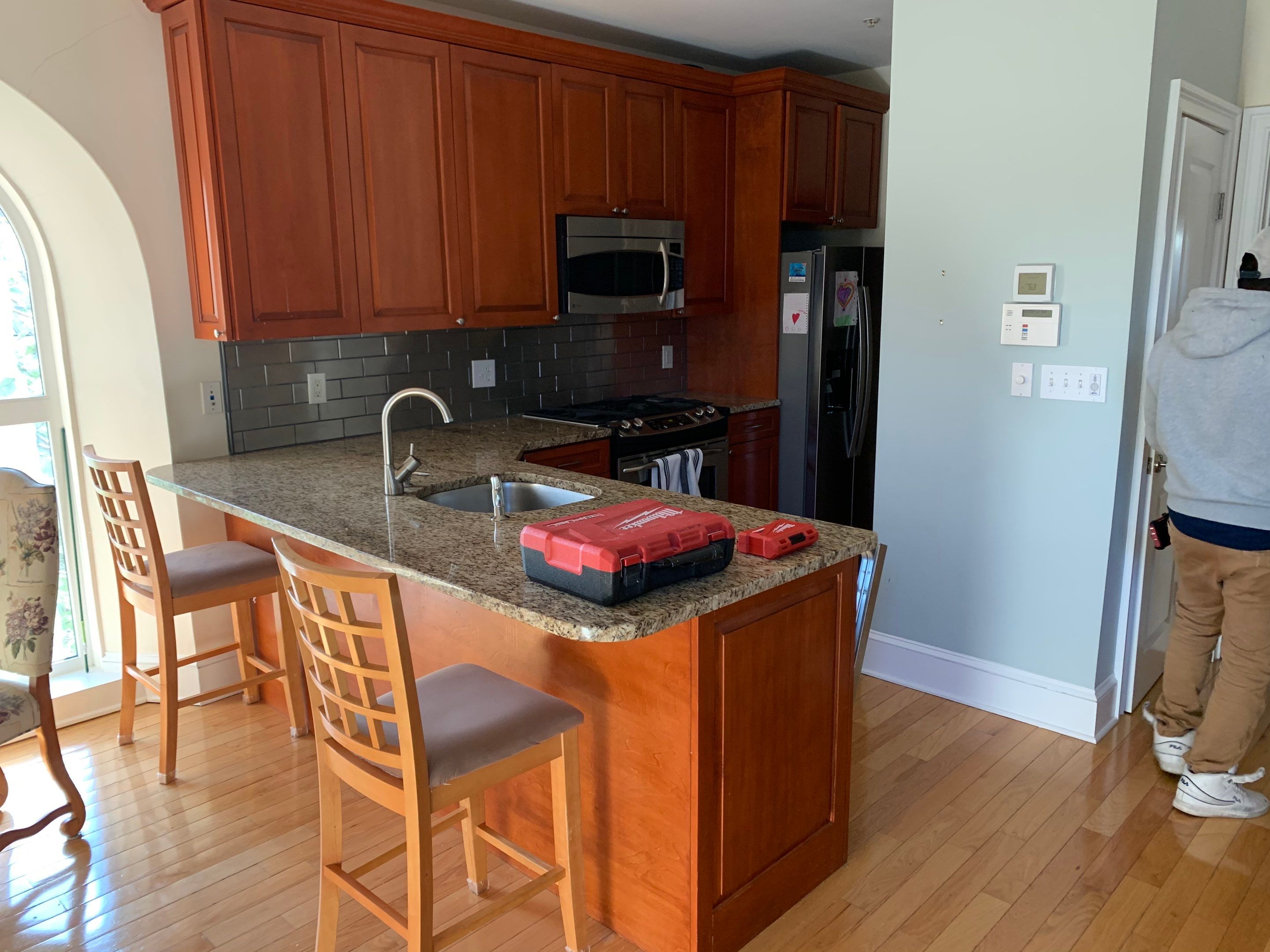 Kitchen Cabinet Painting using Milesi 2k by Trendy Walls Inc.