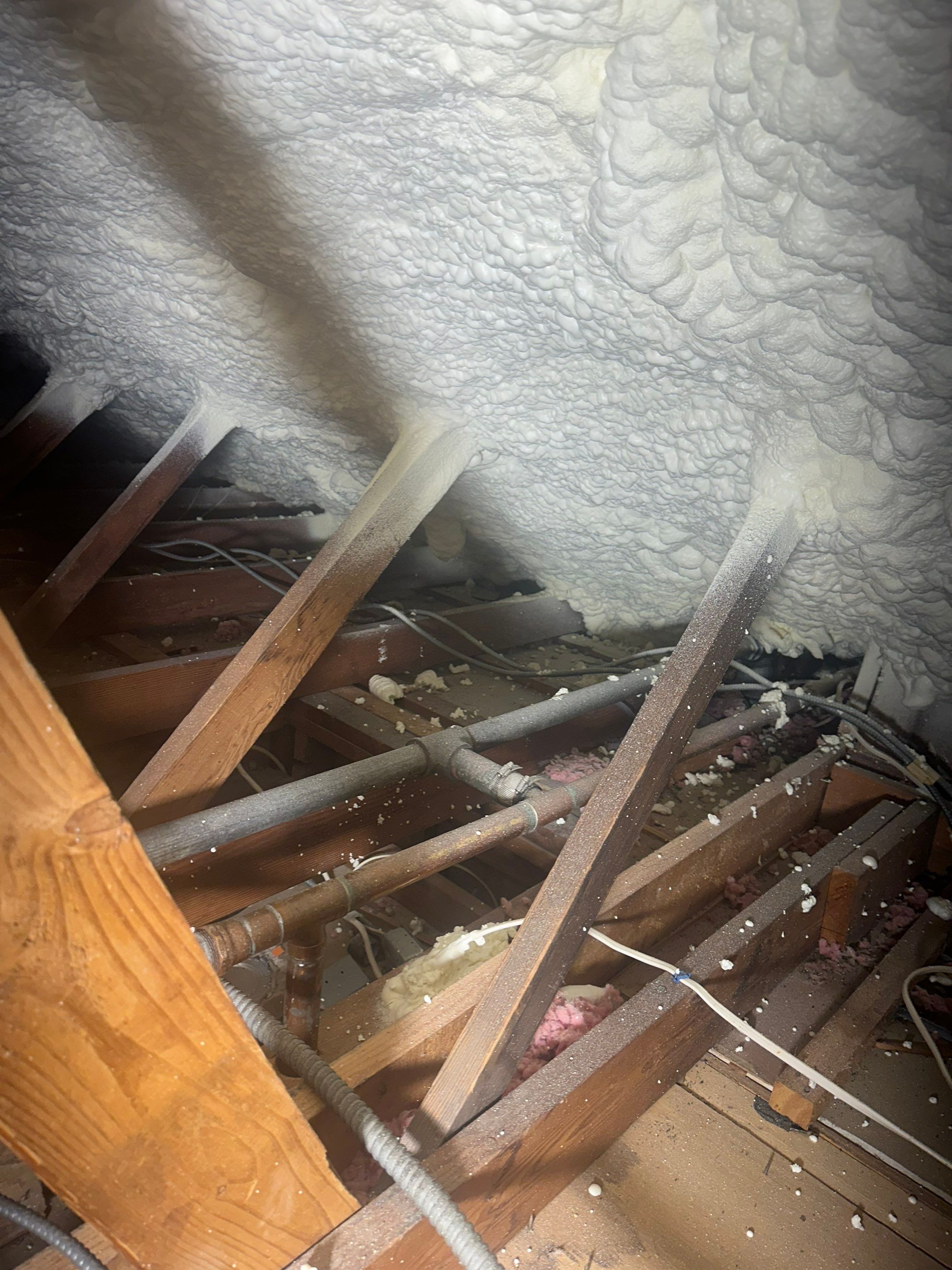 Rim Joist using open cell spray foam by NYS Foam & Energy