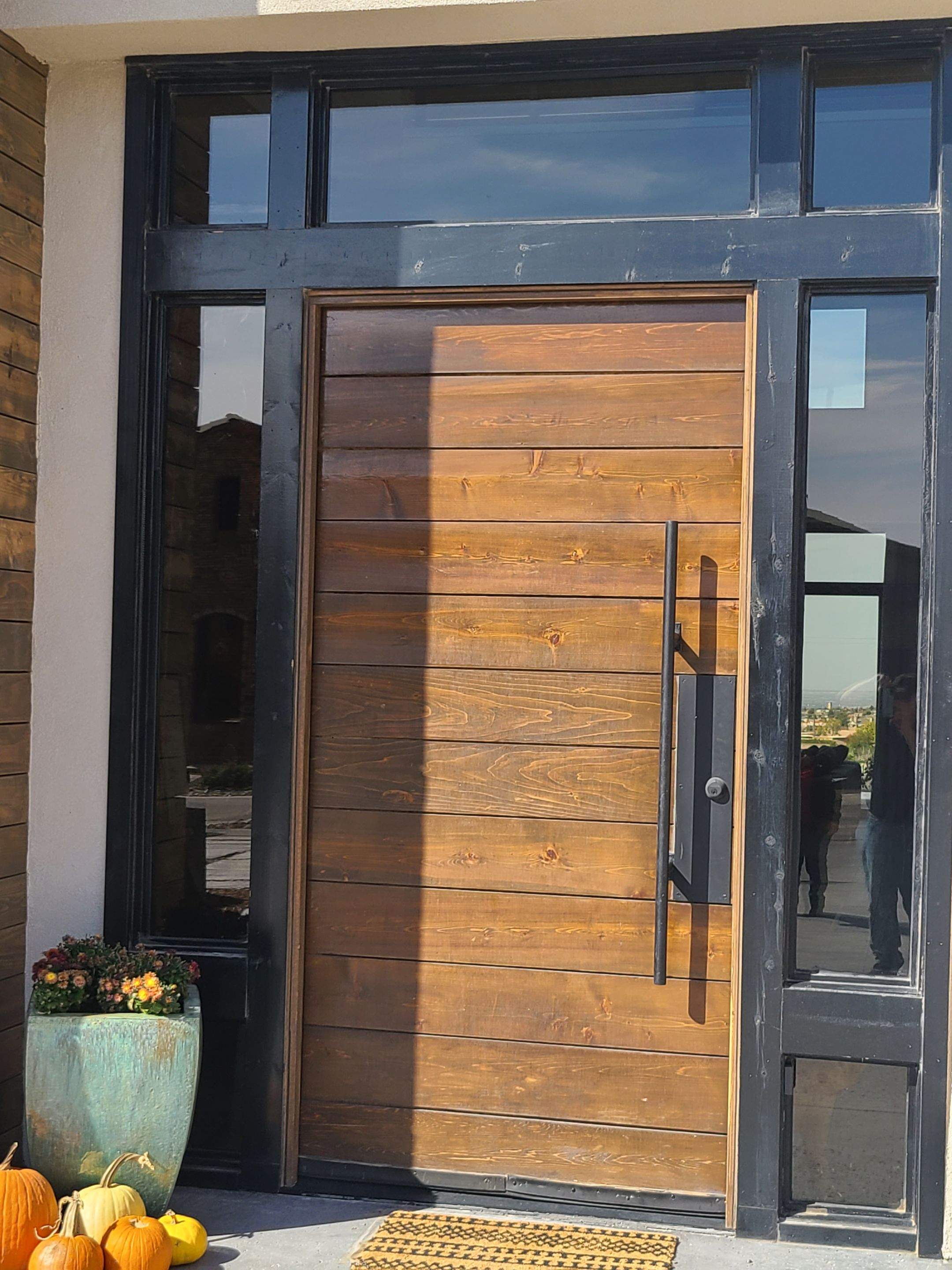 Exterior Wood Staining and Composite Decking Installation by Regal Renovate
