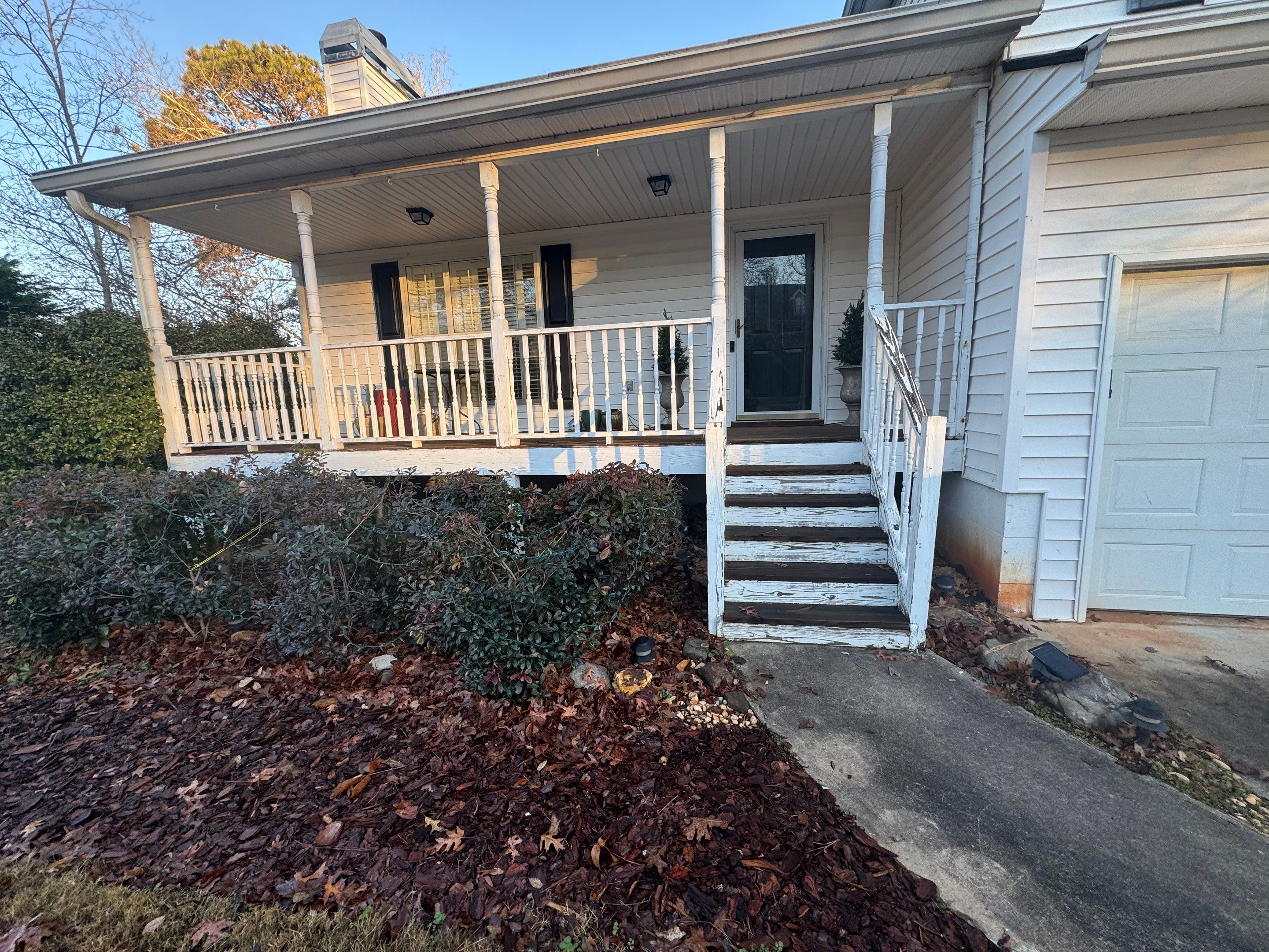 Pressure-Treated Porch Railing and Staircase Upgrade in Cumming by Swift Home Renovations