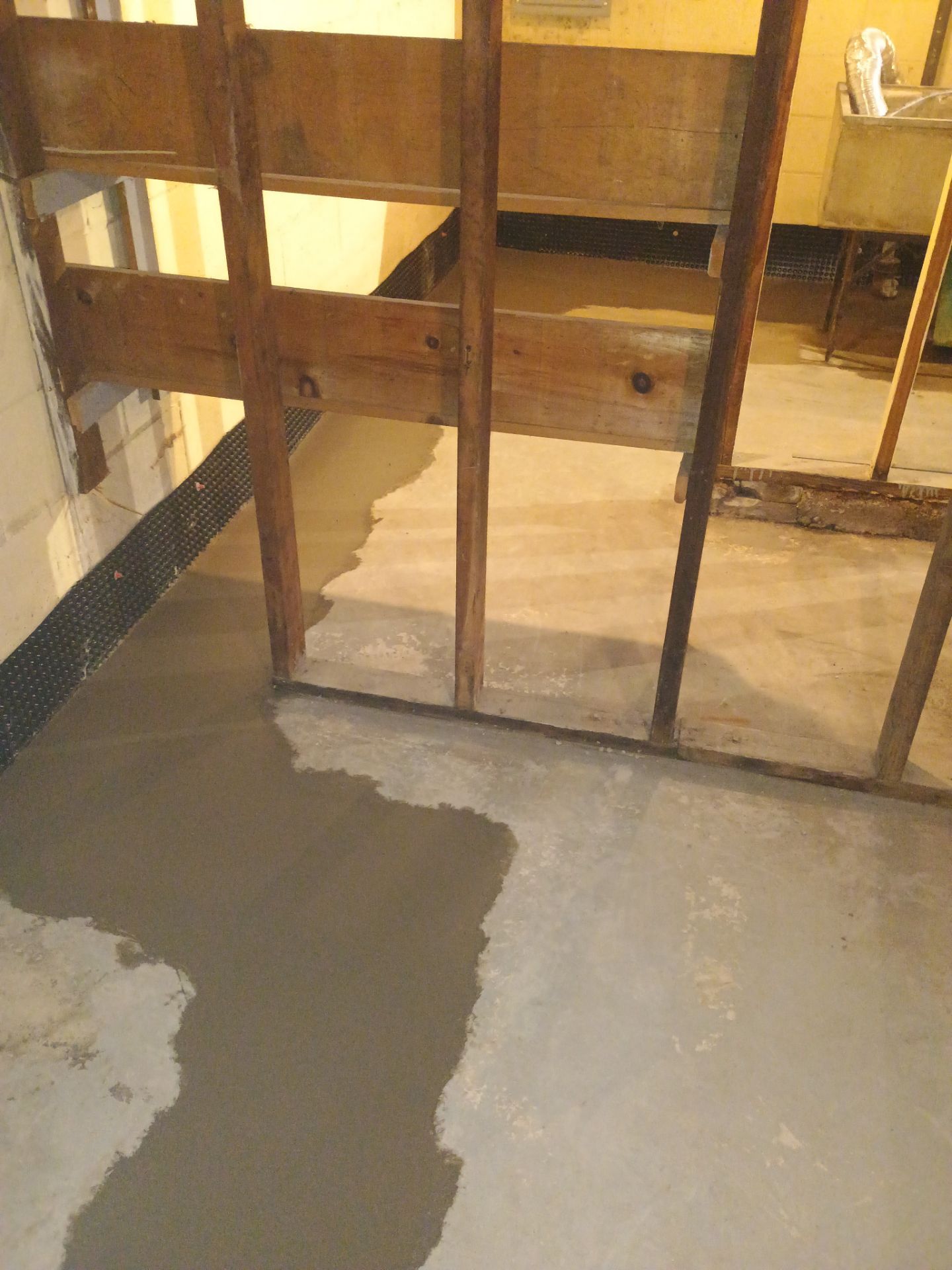 Drain Tile & Sump Pump for Kassie's Rental Property by Waterproofing Northeast