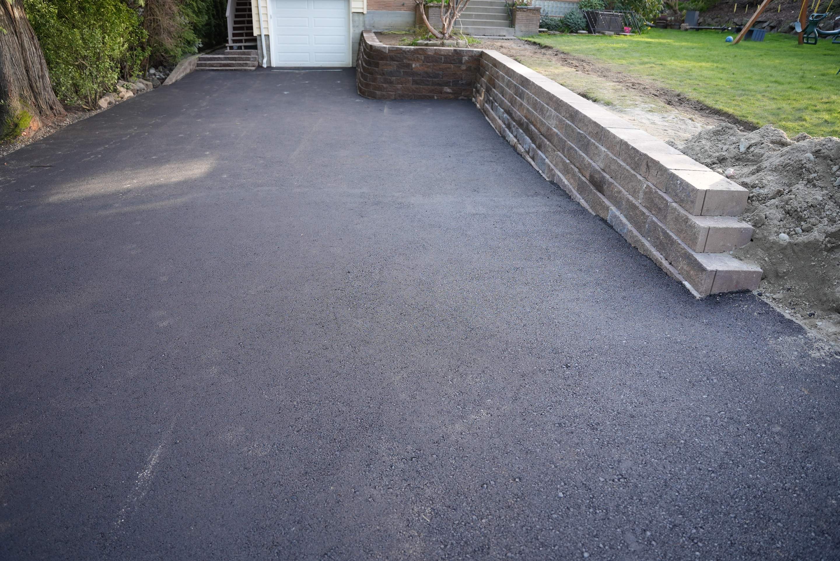 Lorra | Asphalt Driveway Repair & Retaining Wall by Jireh Asphalt & Concrete Inc 