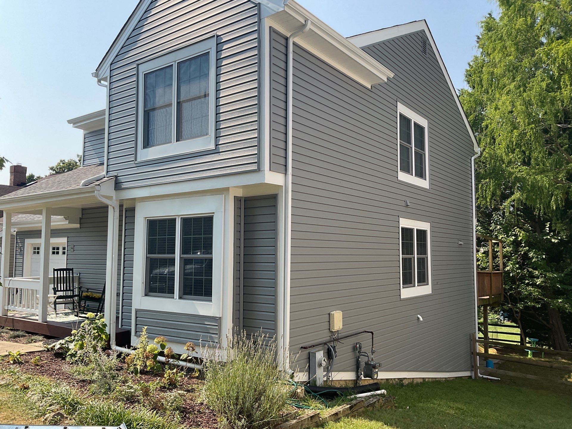 New Prodigy siding with One-piece insulated siding system & Exterior painting   by Alpha Design Services