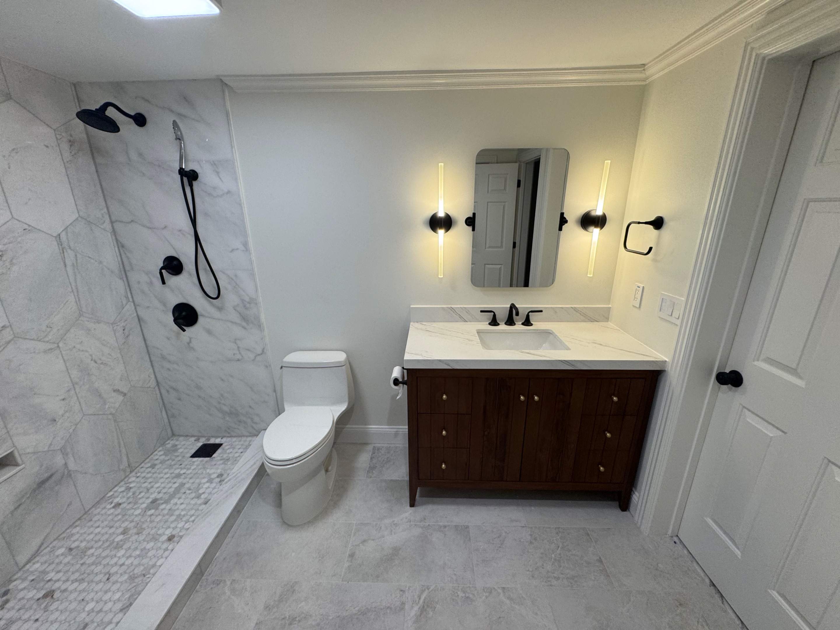 Basement bathroom renovation by Prudencio