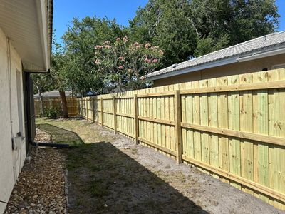 Wood Fence Installation using Wood Board on Board Fence