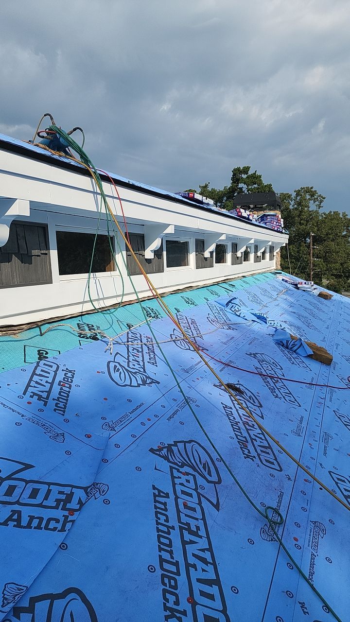 Country Club Roofing Installation by Reset Roofing