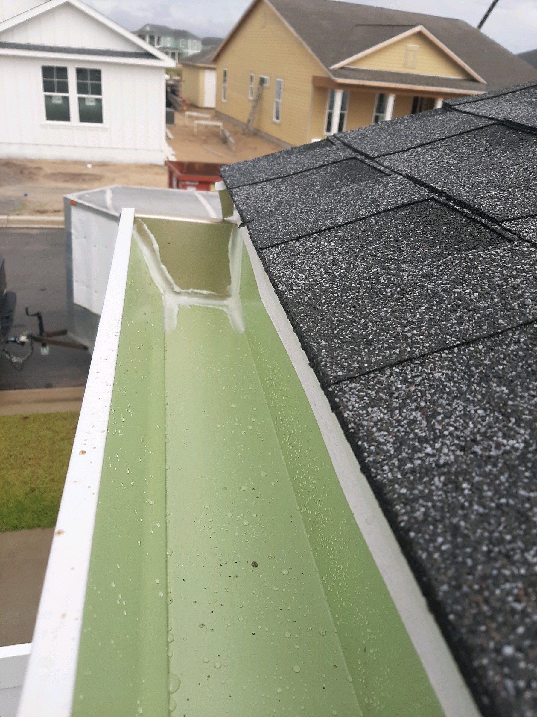 Seamless Gutter Installation using White K-Style Gutters by Gutter Professors