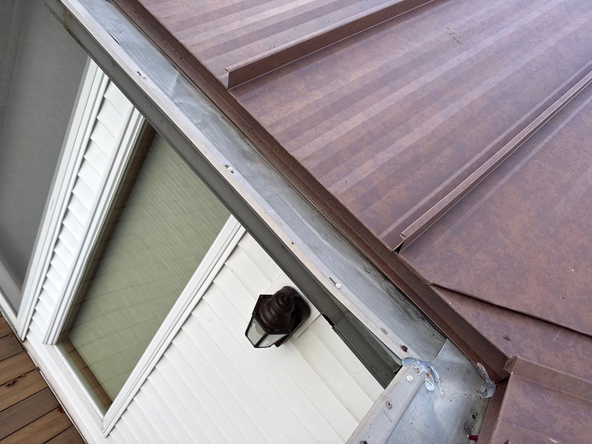 Roof Replacement using MS Standing Seam Roof Western Rust by 180 Contractors