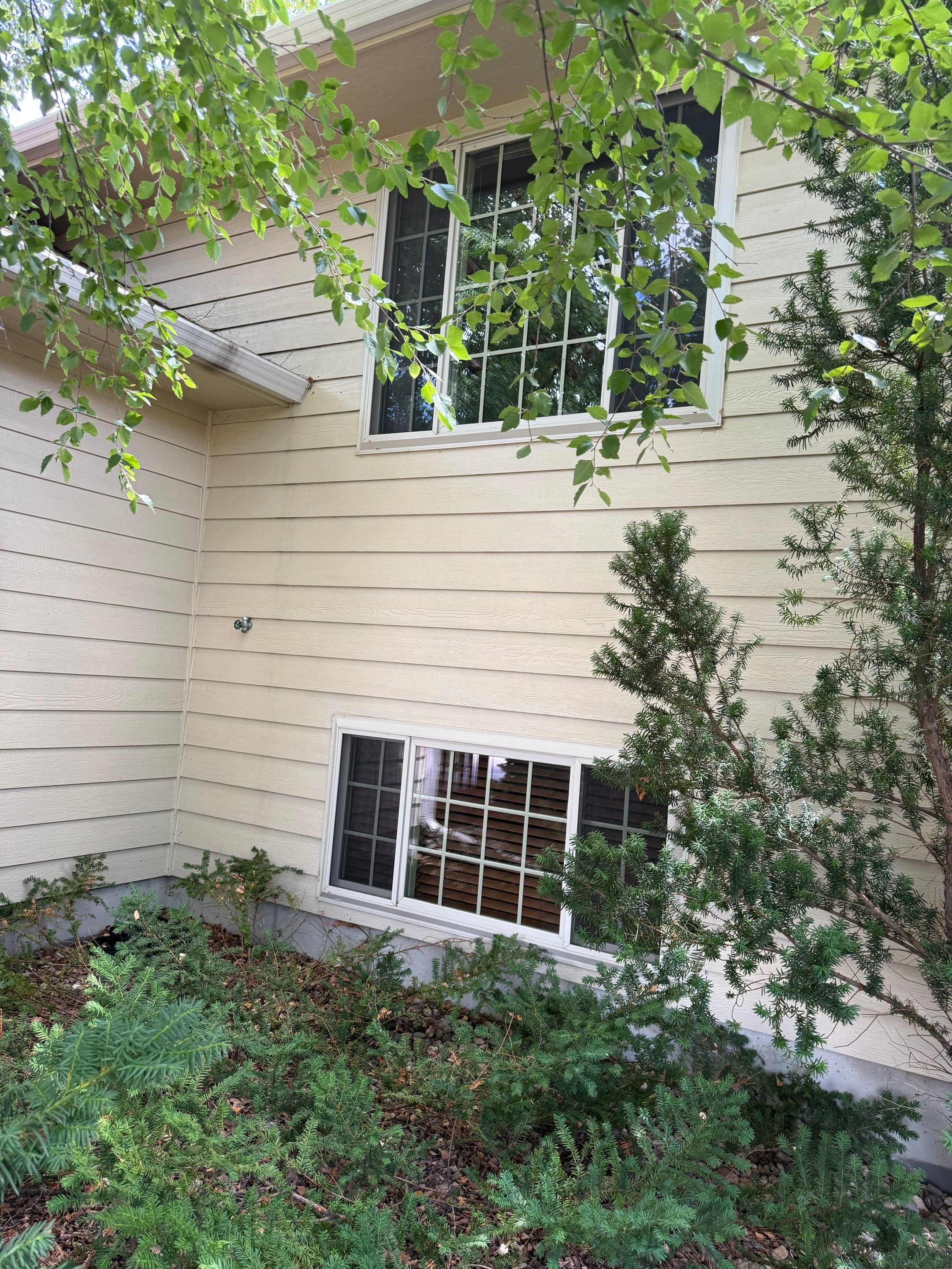 Sioux Falls Exterior Siding Replacement and Custom Deck Upgrade by Select Painting, Coatings & Garage Cabinets