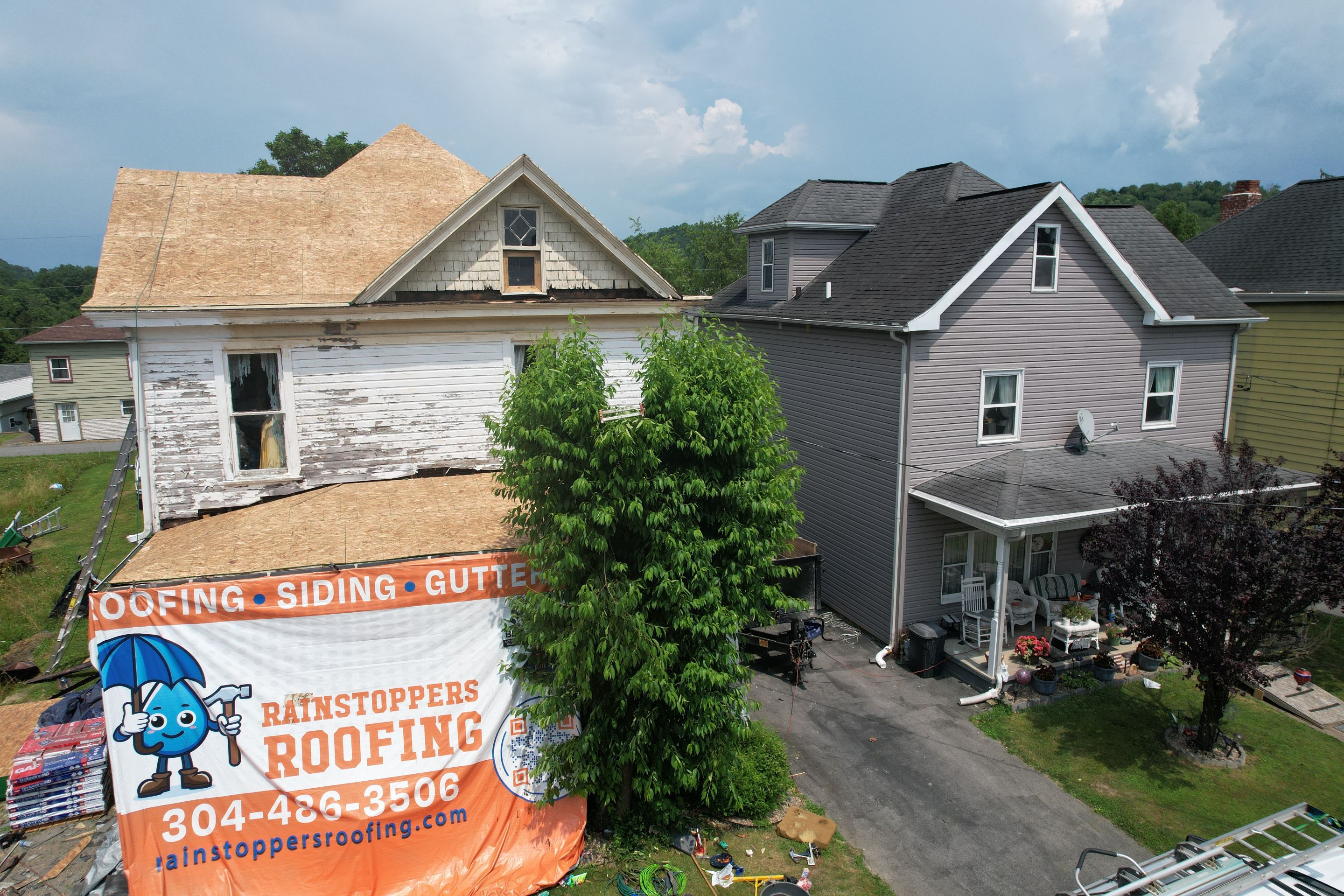 Residential Roofing Installation using GAF Timberline HDZ Charcoal by Rainstoppers Roofing