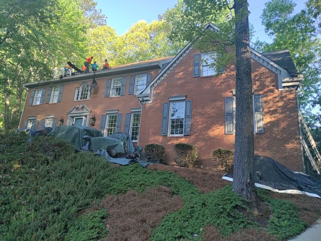 Residential Roofing Installation using Owens Corning Quary Gray by Inspector Roofing and Restoration