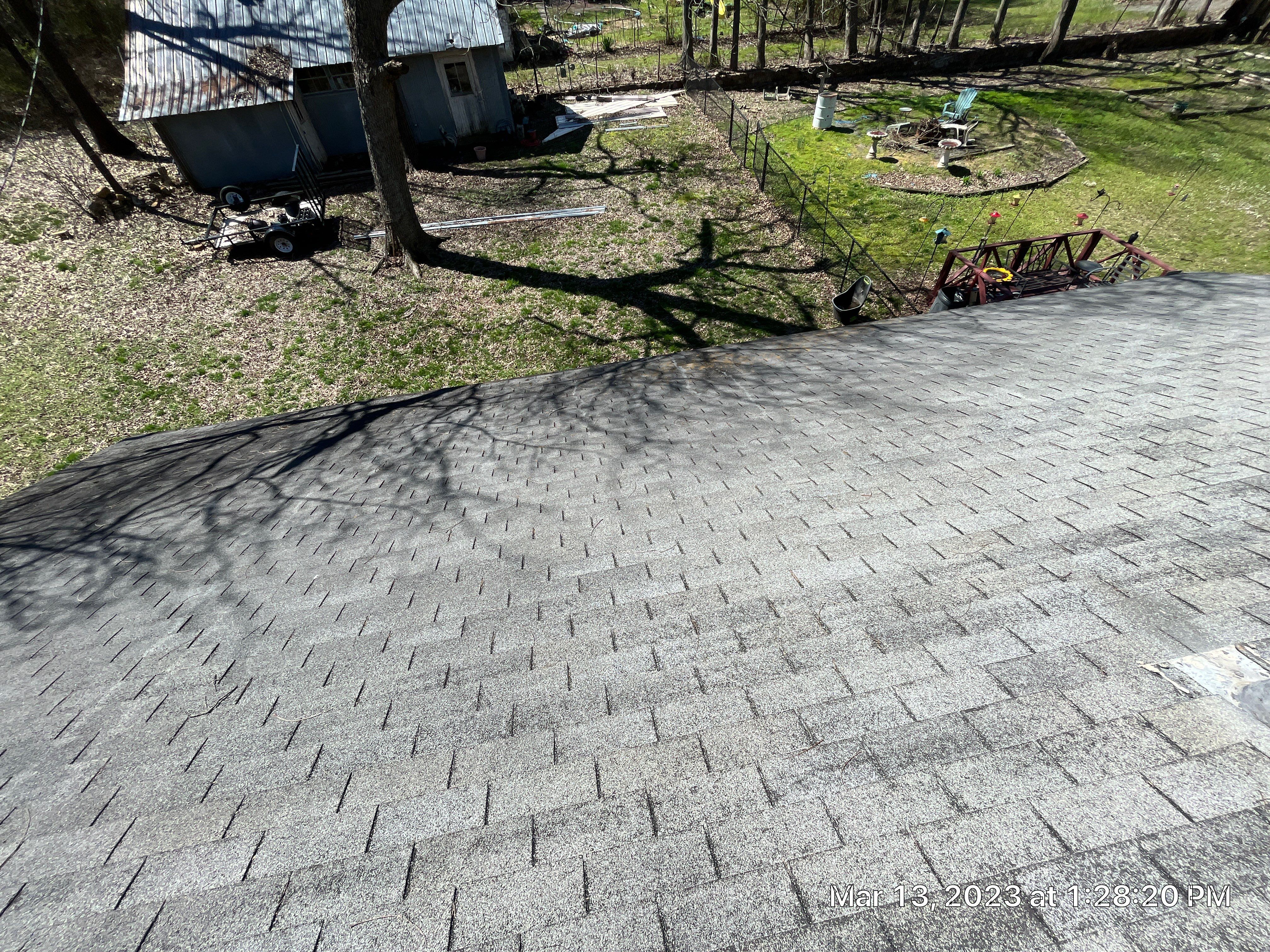 Residential Roofing Installation using 26 Gauge Colored Panels by Hostetler Roofing