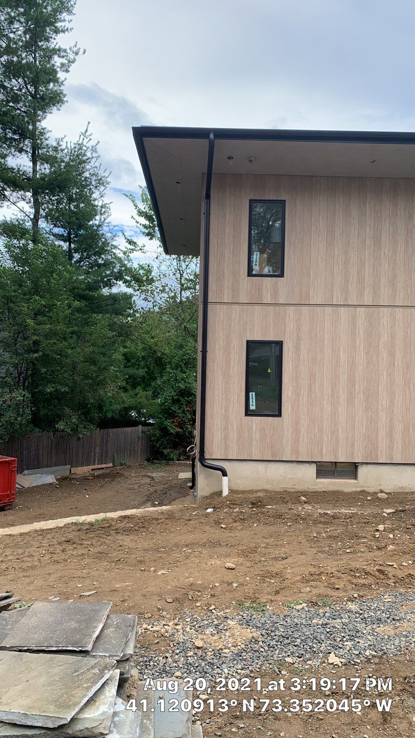 Black Gutters in wesport by A Plus Exterior