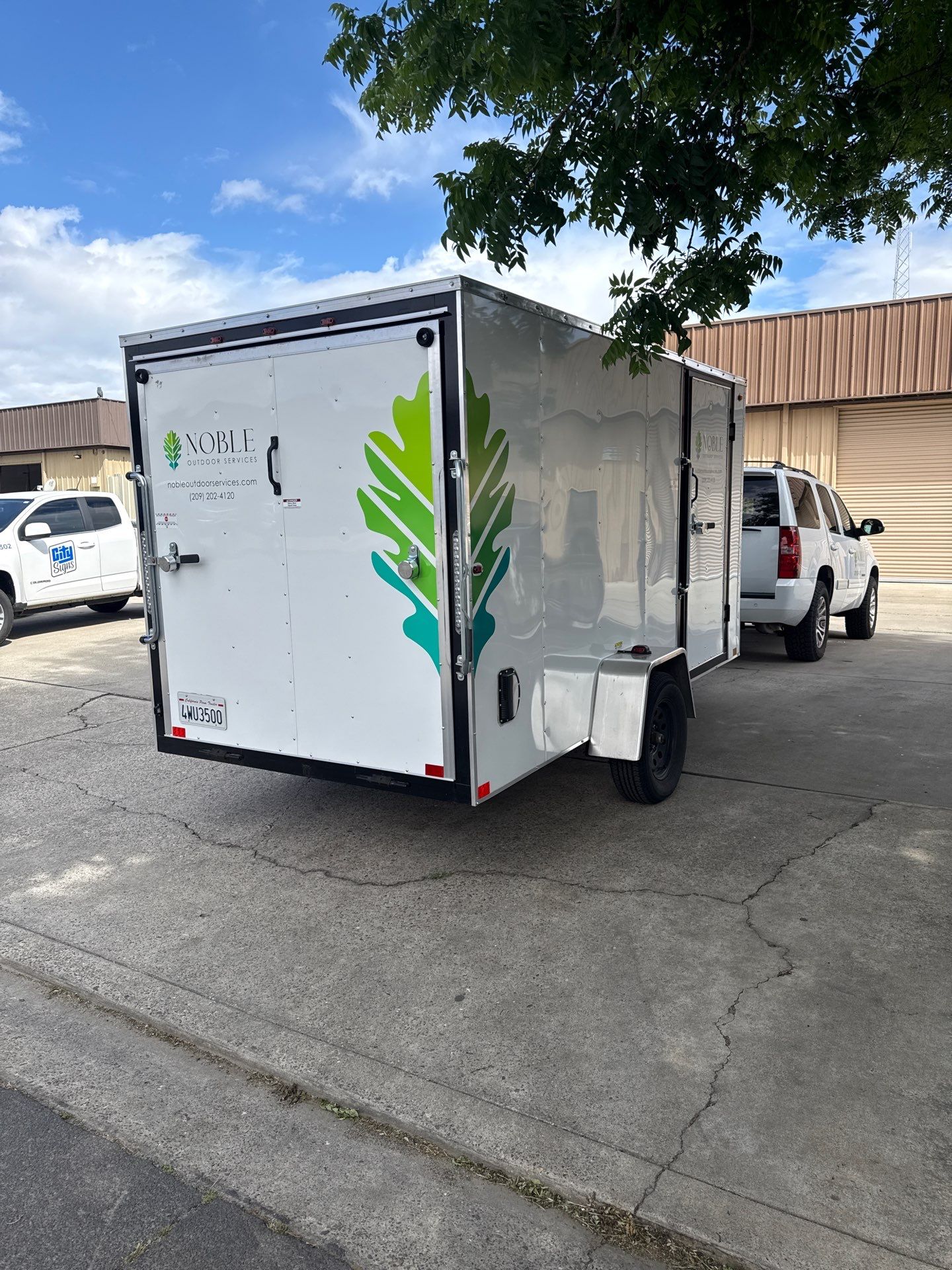 Fleet Branding and Vehicle Graphics for Noble Outdoor Services by City Signs