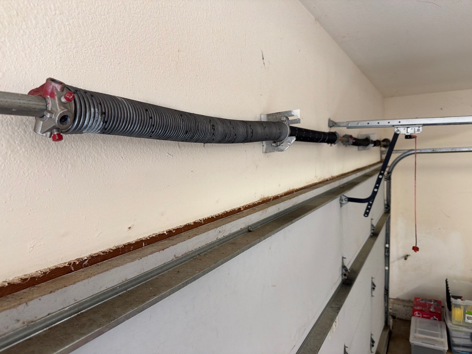Sectional Garage Door Torsion Spring Replacement and Hardware Service by Valiant Garage Door