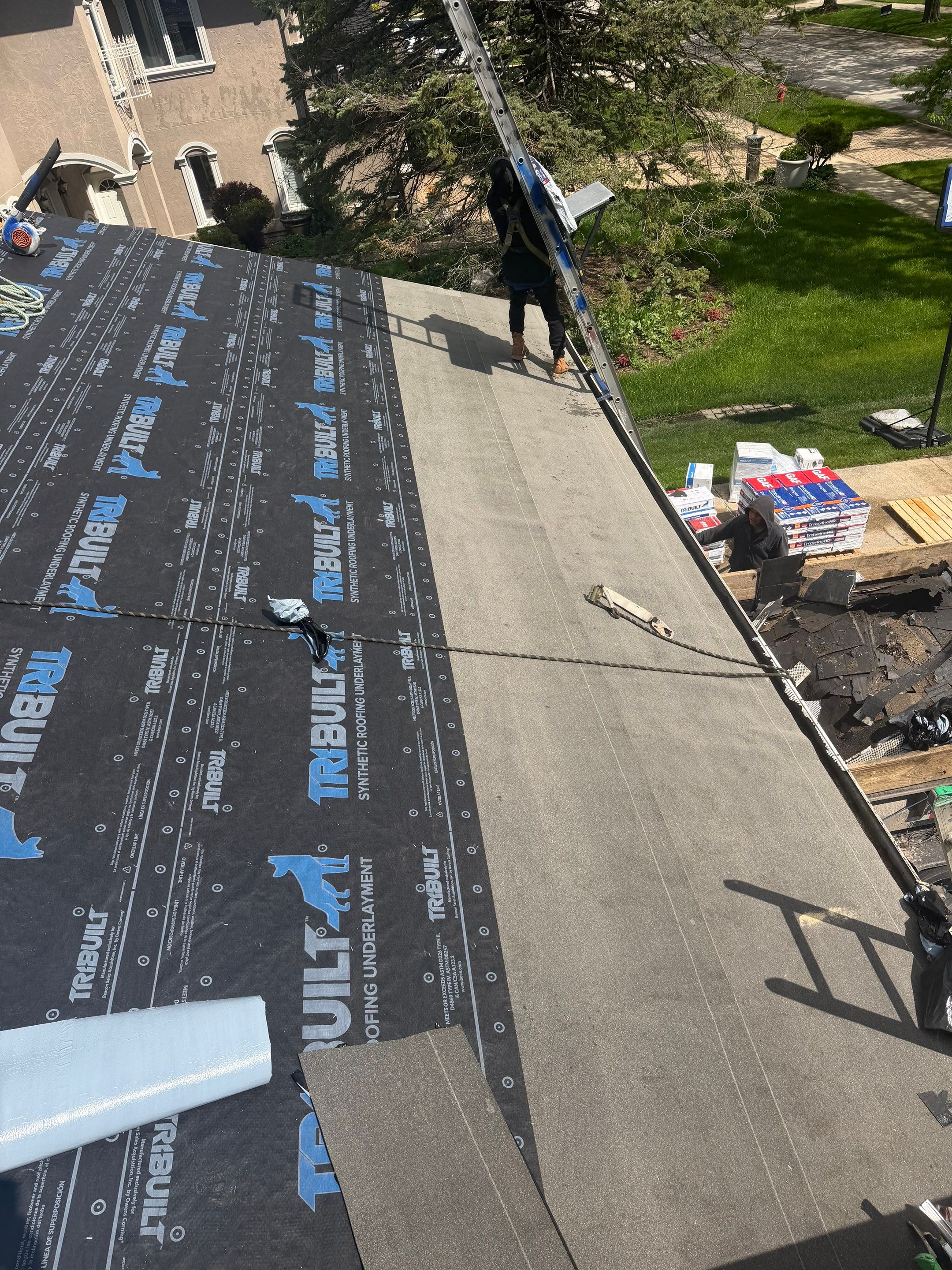 Roof replacement and chimney flashing by Optimal Home Improvement 