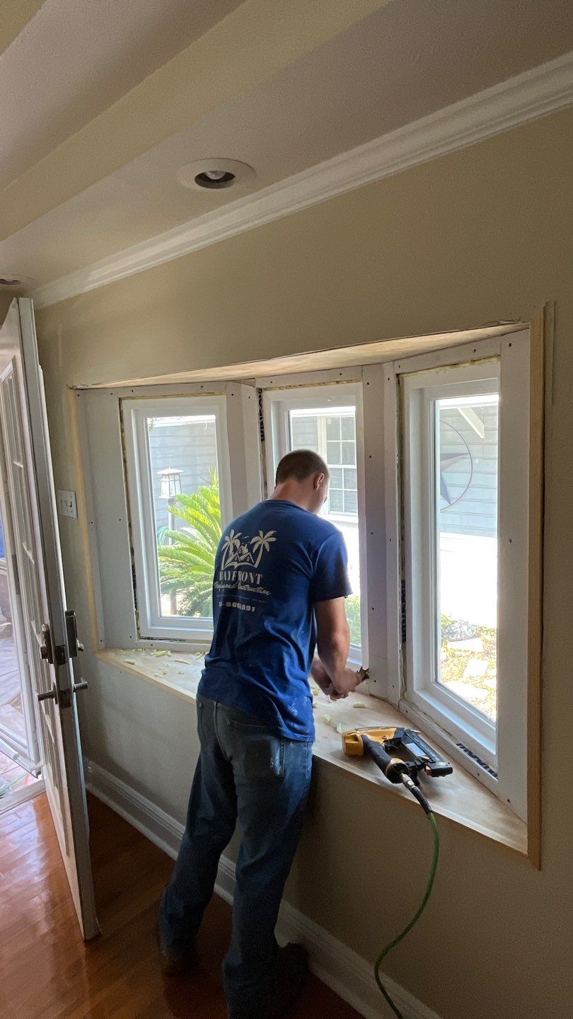 Installing Windows on a Submarine  by Bayfront Roofing and Construction