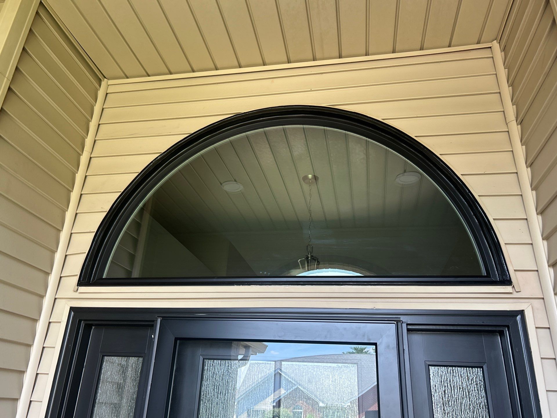 Black Vinyl Window Installation by Merrifield Exteriors, LLC