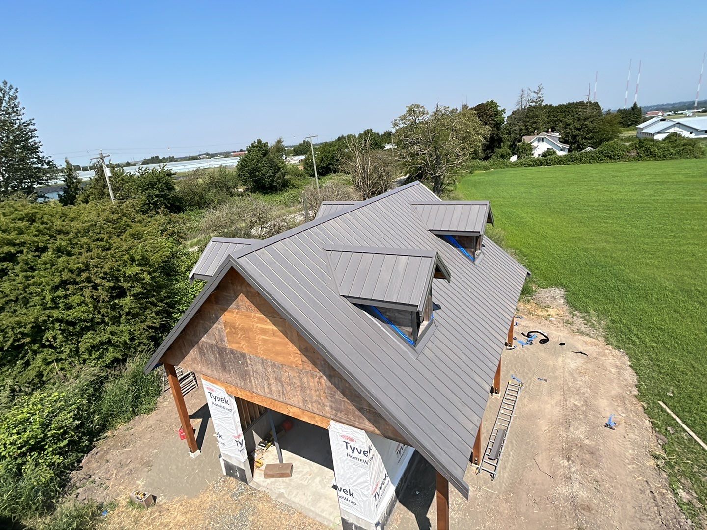 Agricultural Roofing Installation using 12" Prolok metal  by Top Notch Roofing Inc