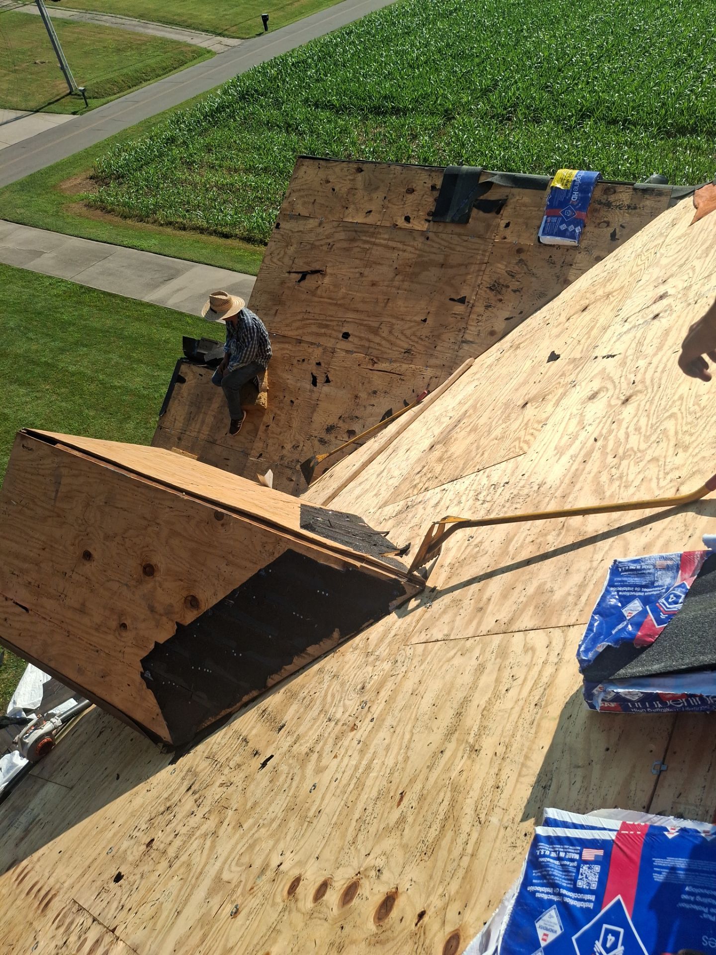 Residential Roofing Installation using GAF Timberline HDZ Charcoal by Rainstoppers Roofing
