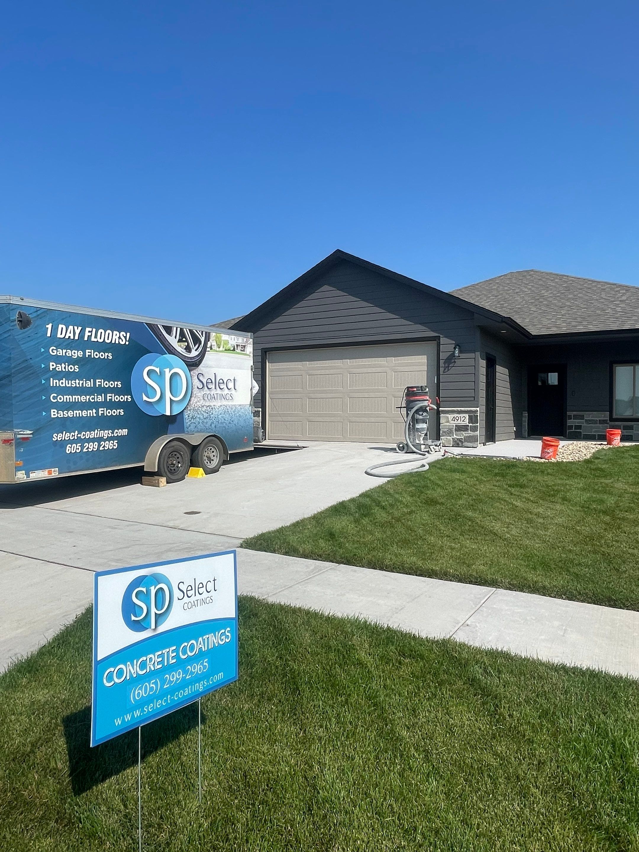 Sioux Falls Residential Concrete Patio and Walkway Coating by Select Painting, Coatings & Garage Cabinets