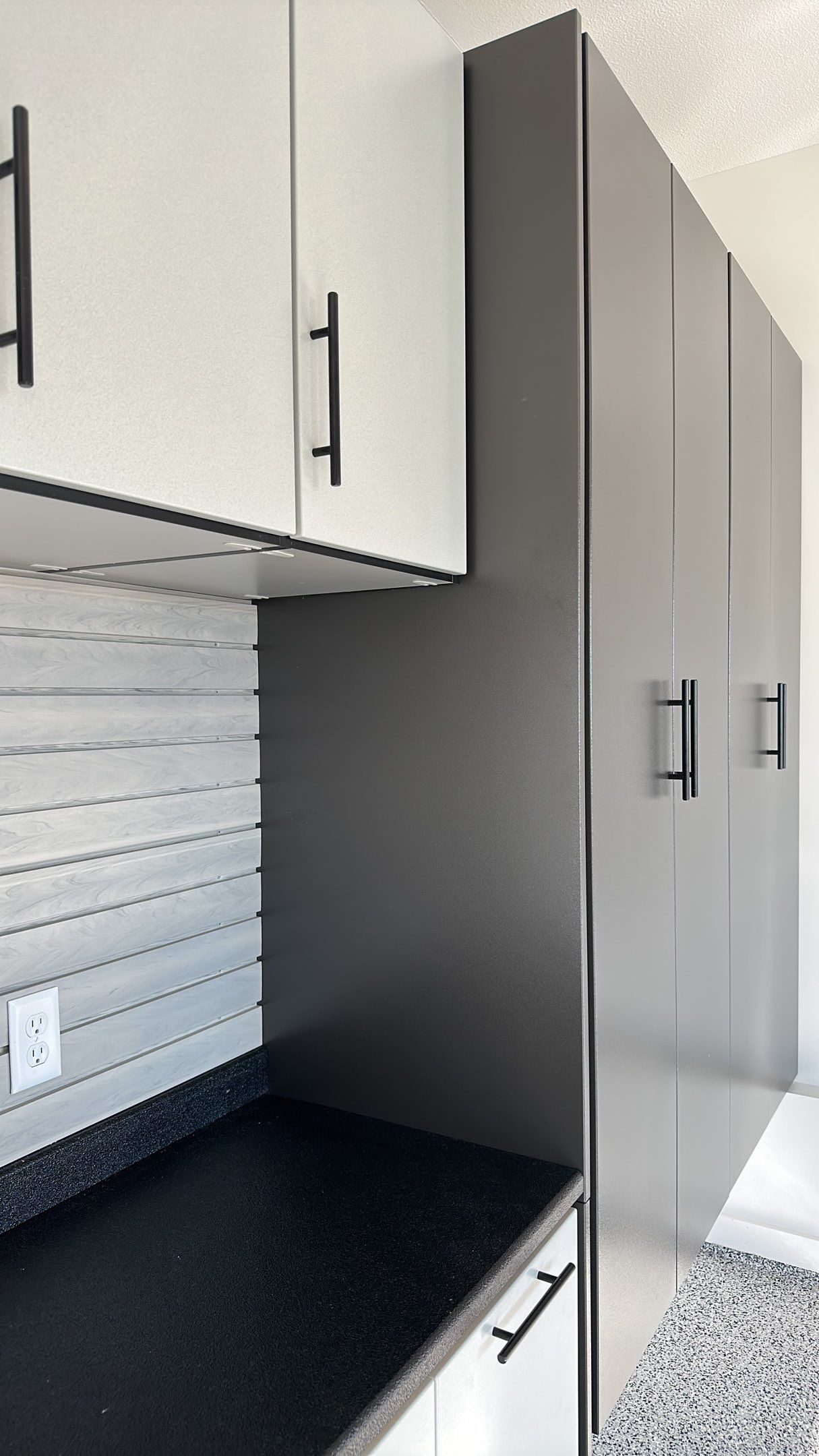 Vicki W. upgraded her garage with a Banner Garage Floor and Cabinets by Banner Garage