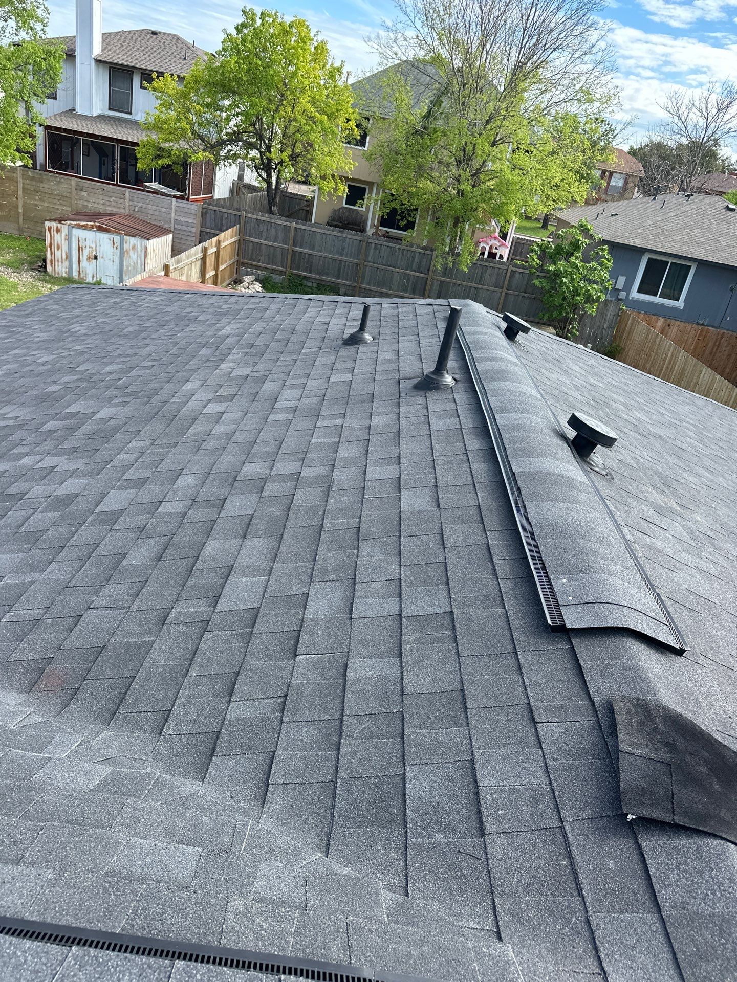 Residential Roofing Installation Owens Corning Oakridge Onyx Black by DeZign Roofing & Exteriors