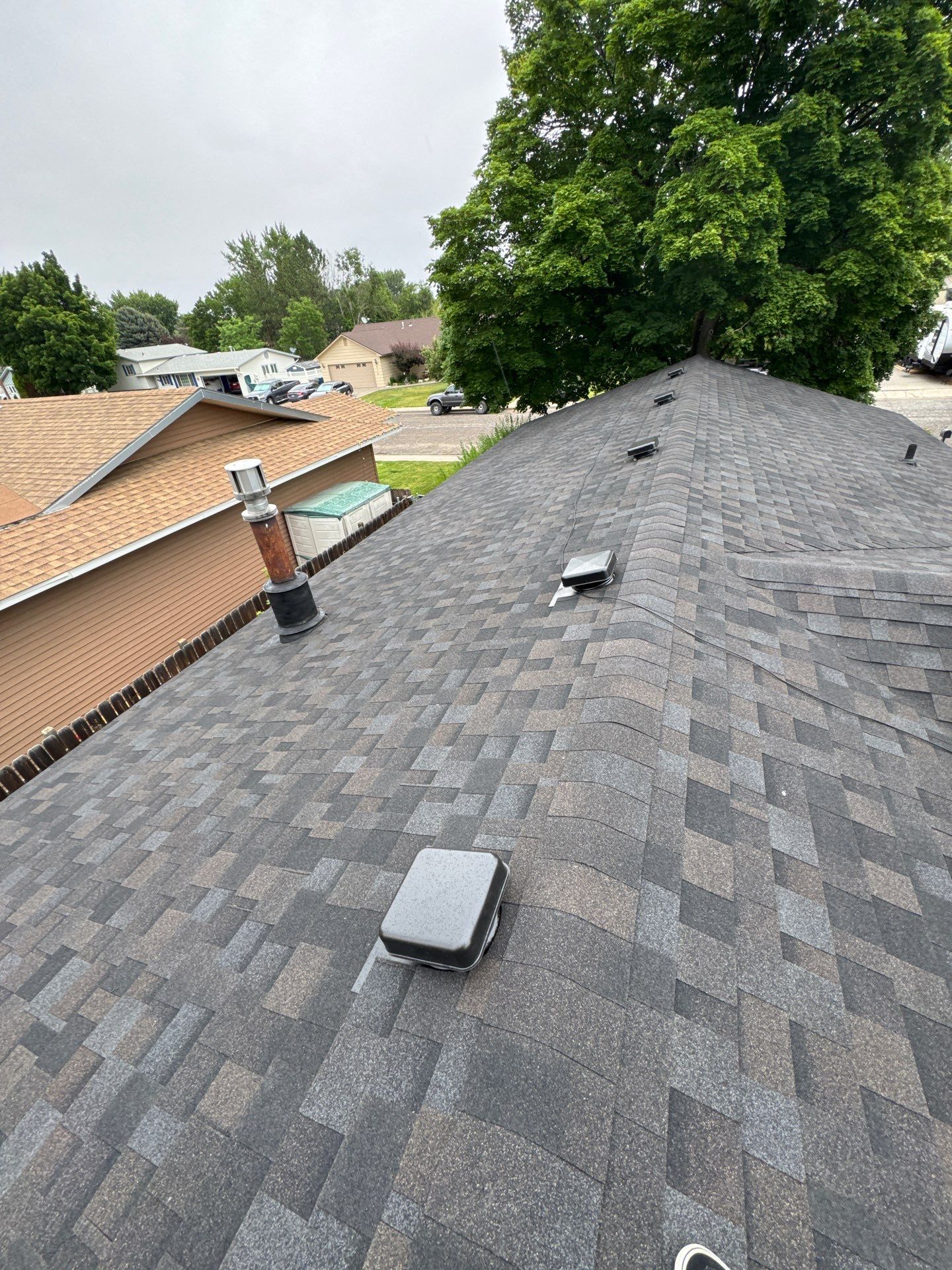 Residential Roof Replacement With Dark Gray Architectural Shingles in Mountain Home by Olive Roofing
