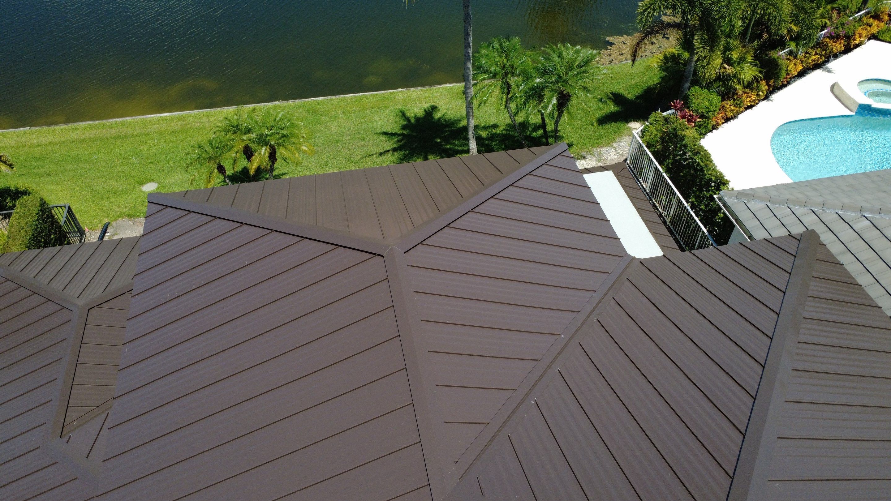 Residential Roofing Installation using 1" Nail strip metal roof by BLUES BROTHERS ROOFING