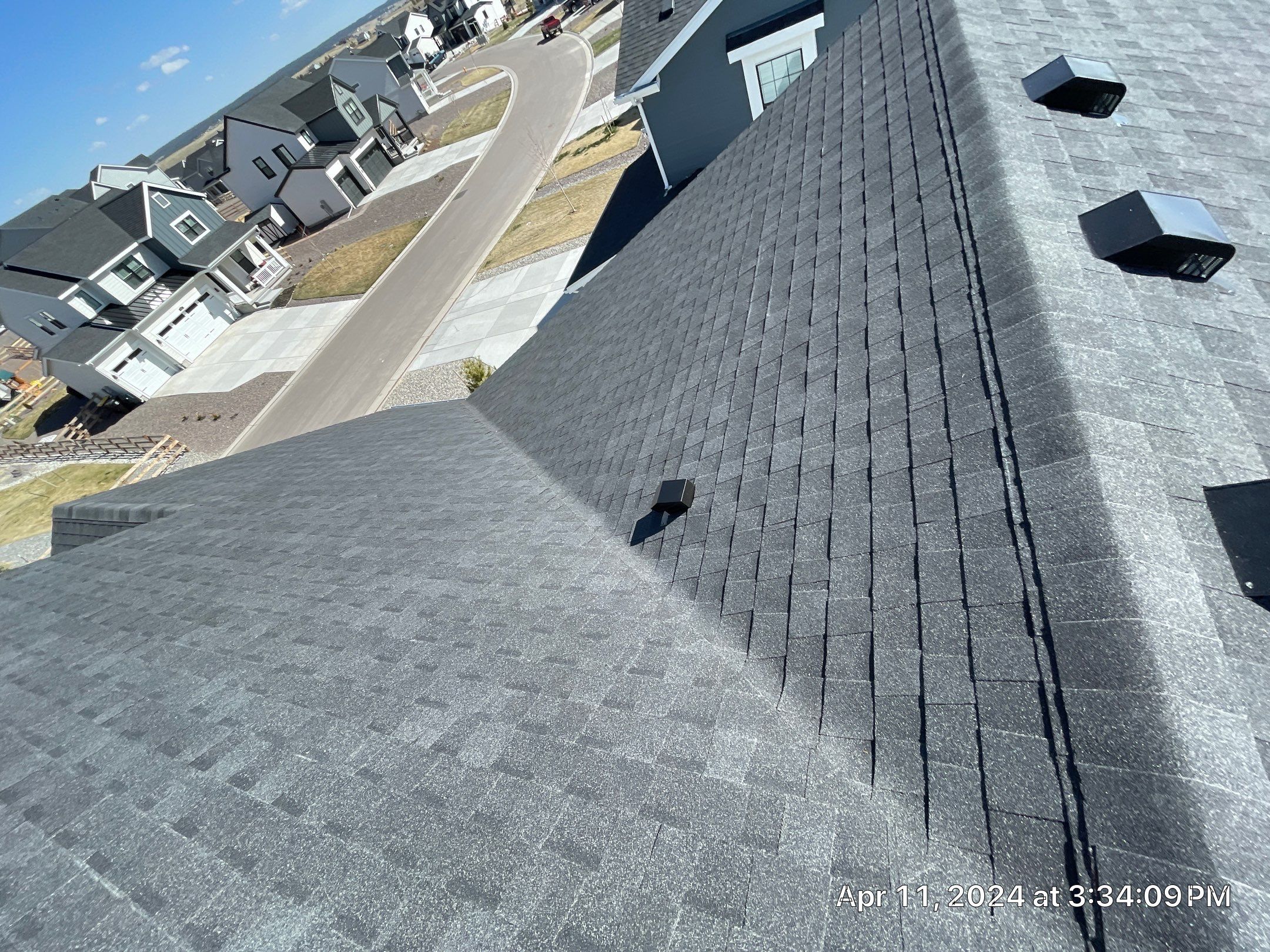 Residential Roofing Installation using Atlas Pinnacle Impact Black Shadow by Blue Peaks Roofing LLC 