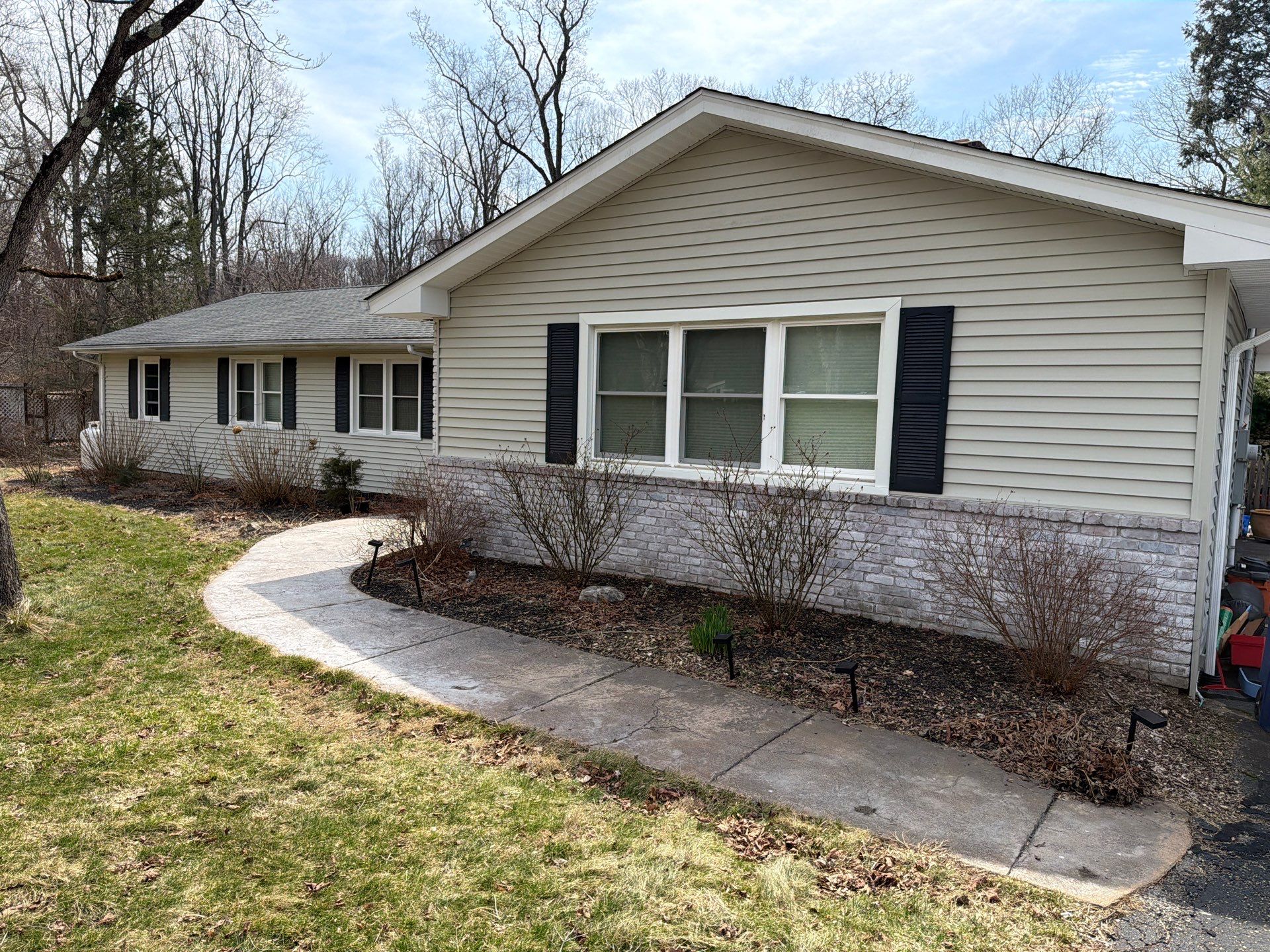Comprehensive Spring Cleanup and Landscape Bed Mulching in Orange by Diamond Image LLC