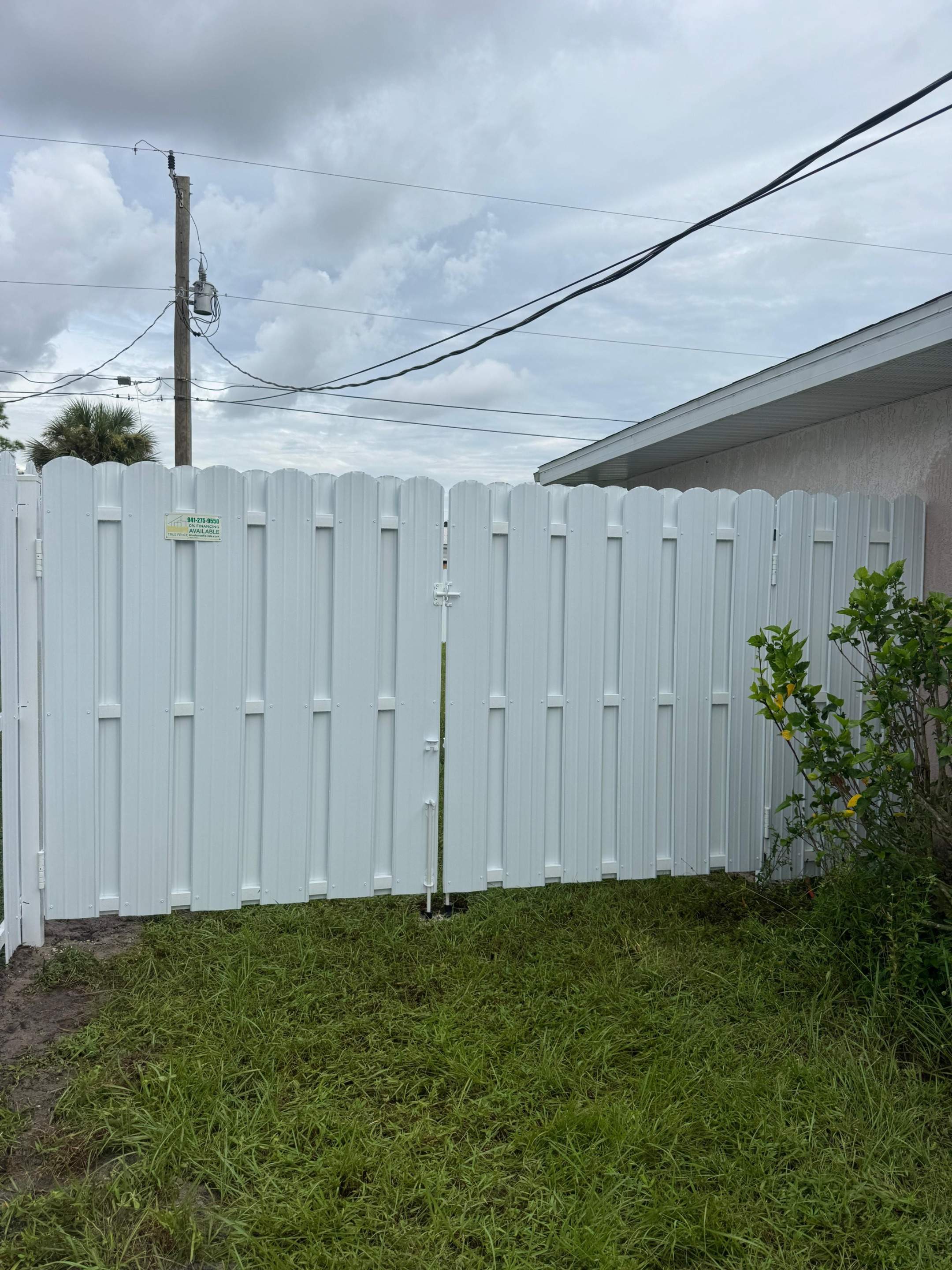White Vinyl Privacy Fence Installation in North Port by True Fence LLC
