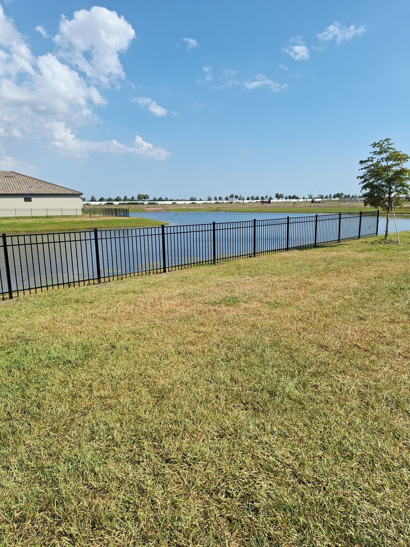 Aluminum Fence Installation using Black 3 Rail Aluminum Fence by Asap fence and gates, LLC