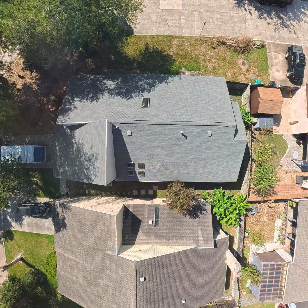 Asphalt Shingle Roof Repair and Skylight Sealing in Houston by One Legacy United