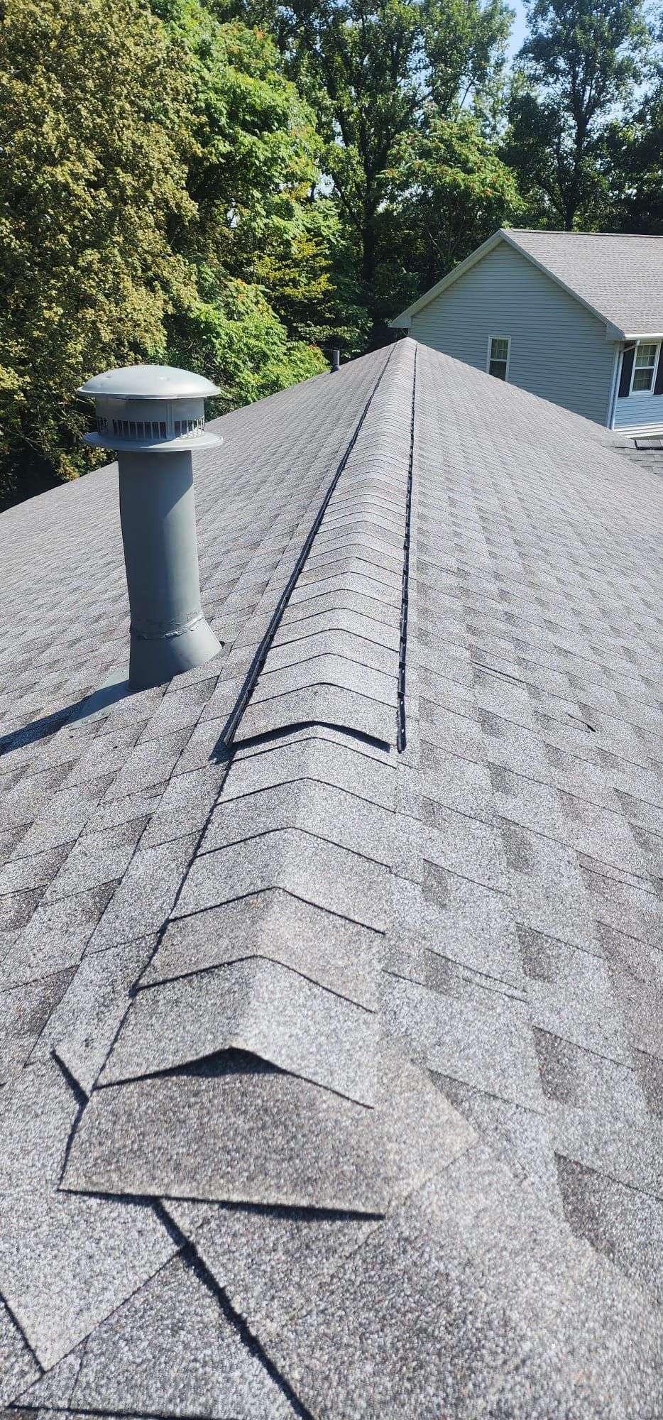 Residential Roofing Installation using GAF Timberline HDZ Pewter Gray by Rainstoppers Roofing