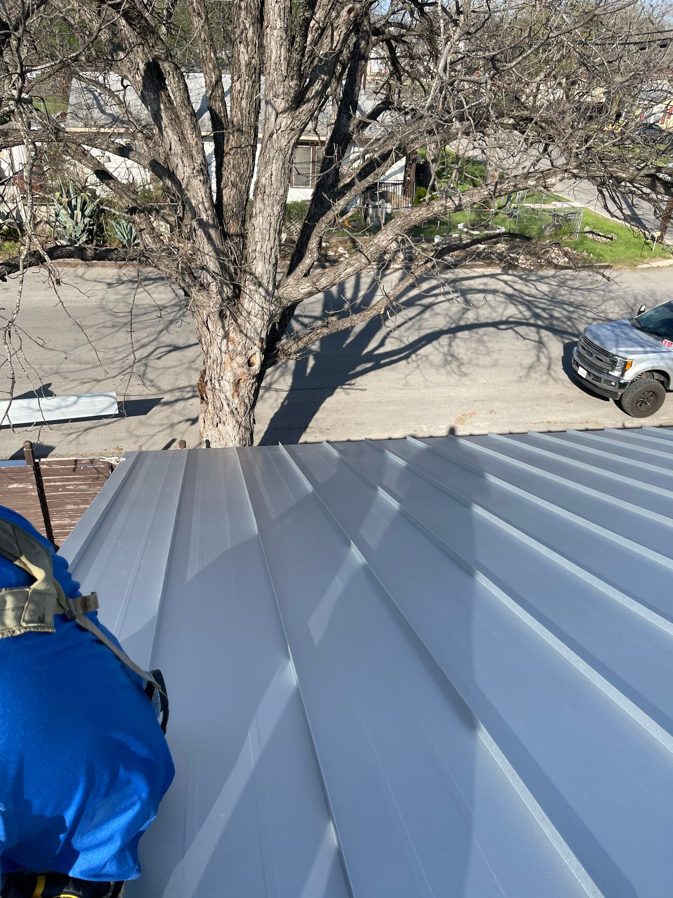 Residential Metal Roof Installation using McElroy Metal by Premier Roofing and Contracting