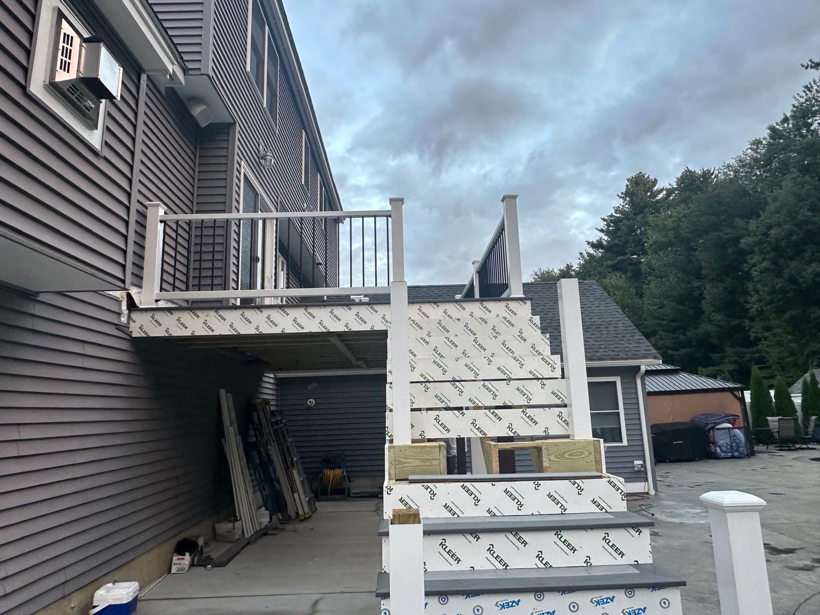 Roof, Trim, Deck, and Gutter Restoration by Mighty Dog Roofing of Greater Middlesex County