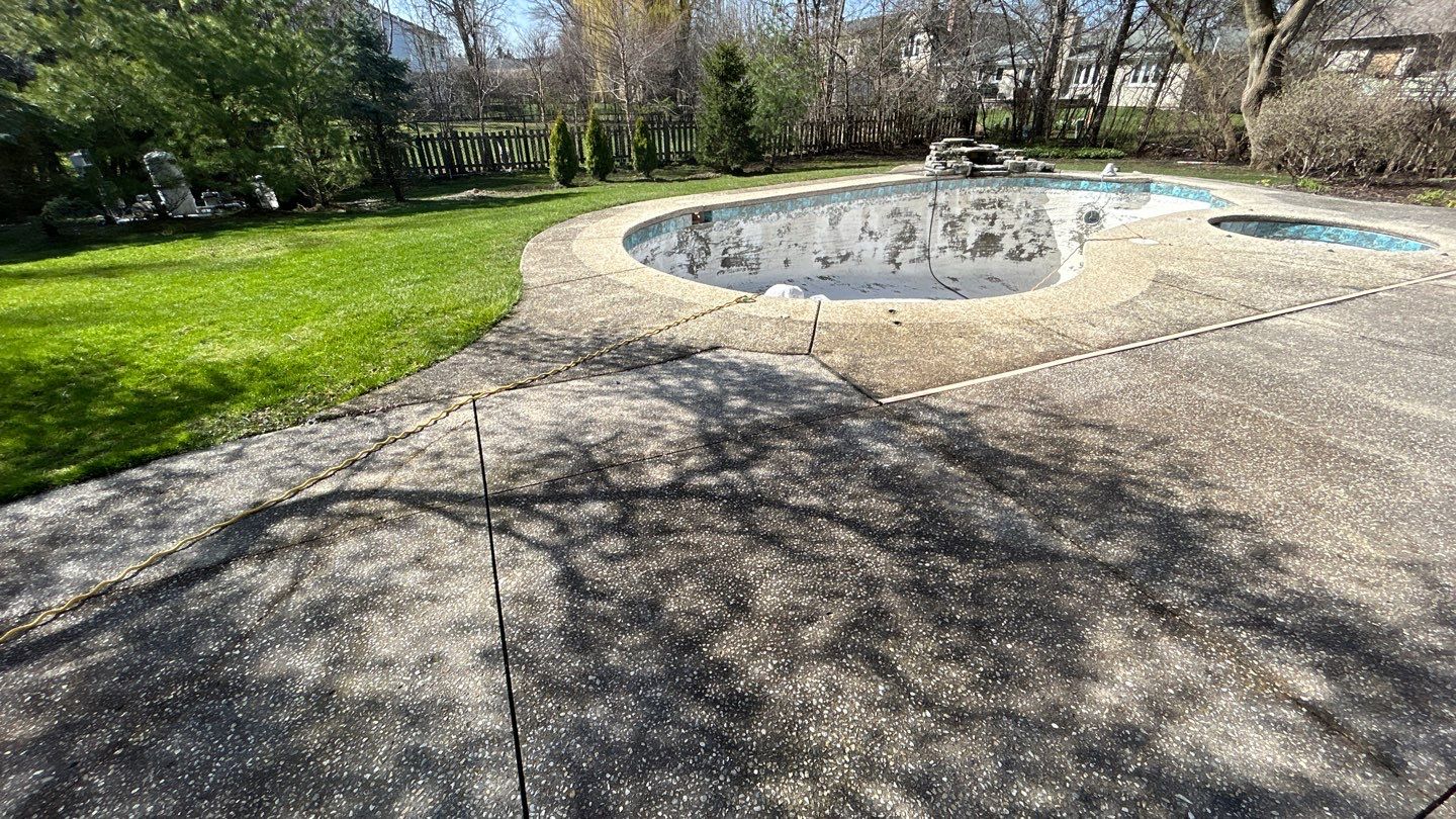 Aggregate Clean and seal using low gloss sealer by Northern Power Washing LLC.