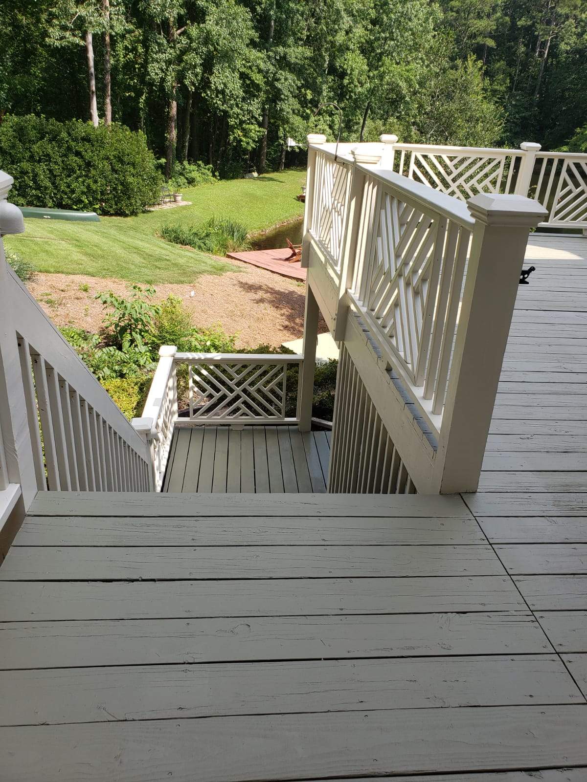 Roswell Deck Restoration Featuring Pressure-Treated Wood and Grey Finish by Swift Home Renovations 