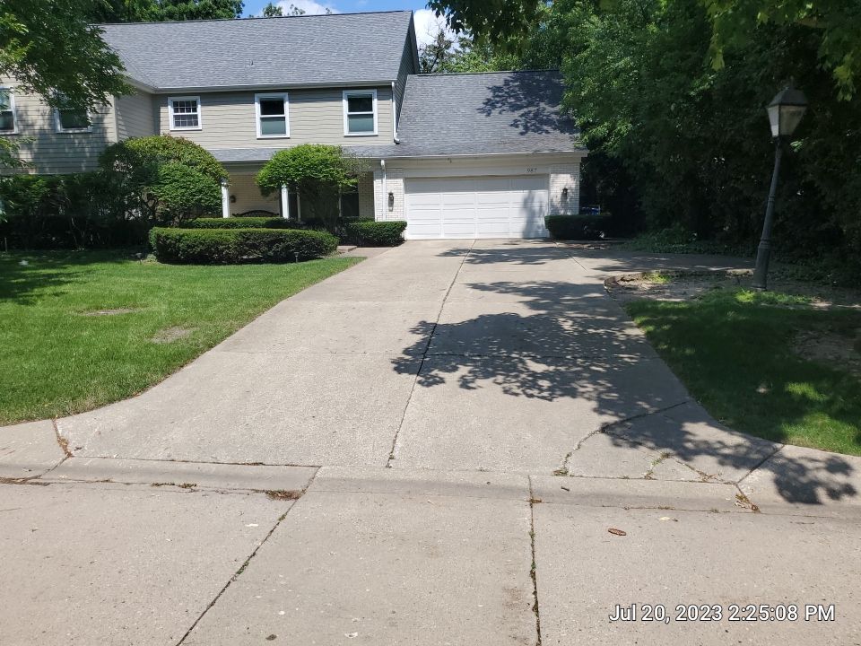 Aggregate concrete cleaning and sealing using Surebond SB-9000 by Northern Power Washing LLC.