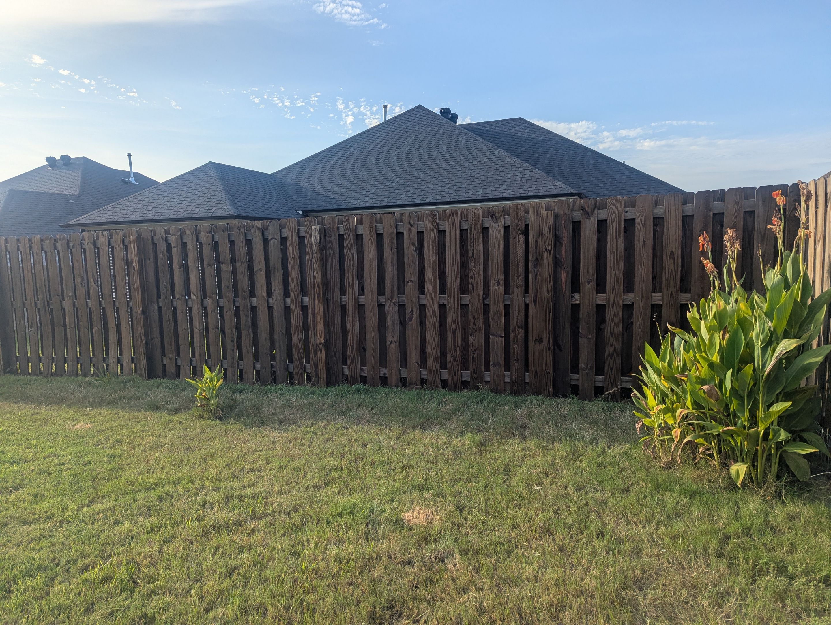 Touching Up a Fence in Whitehouse by Quality Coats Painting