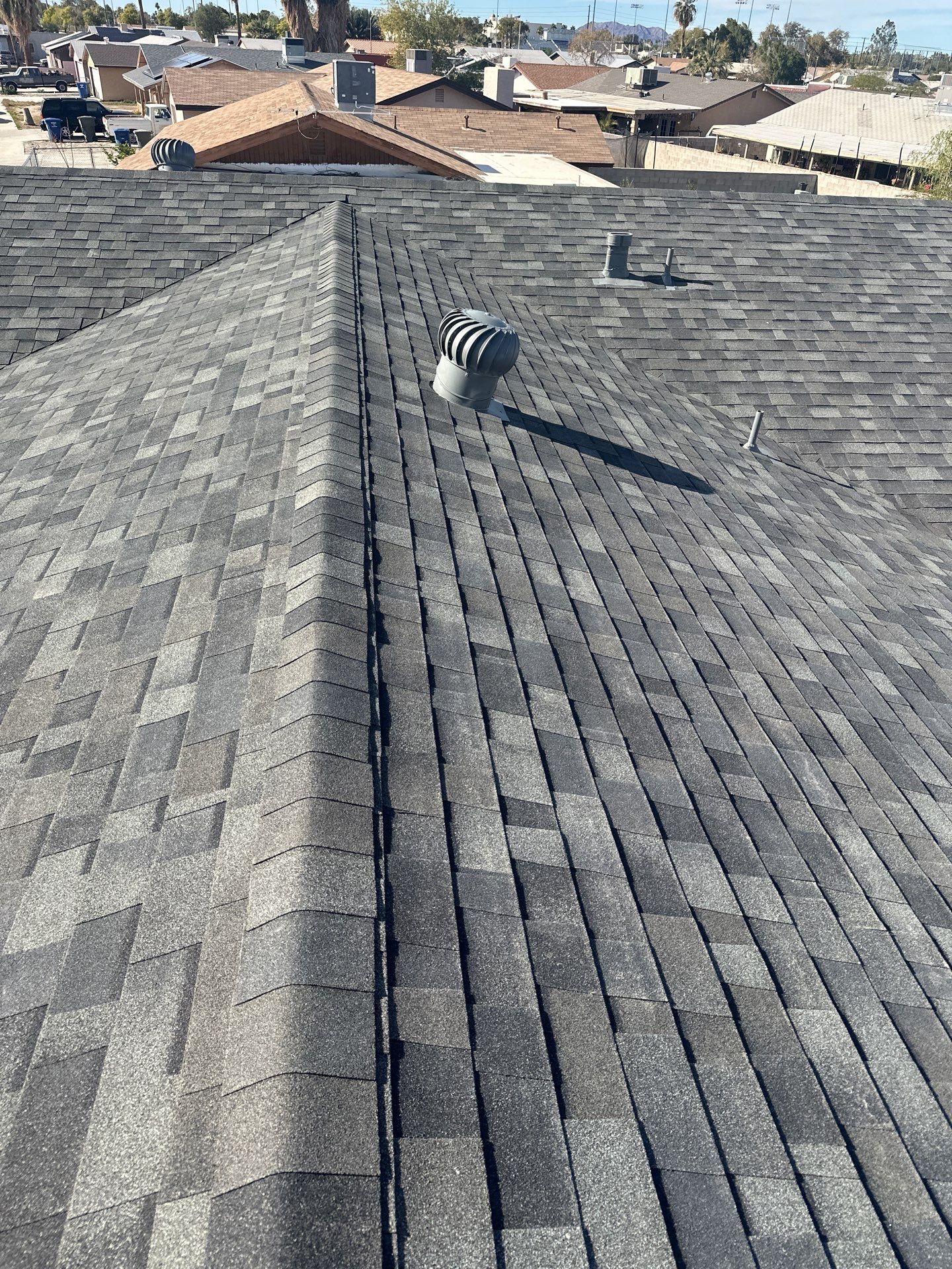 Estate Gray Shingles by Reimagine Roofing