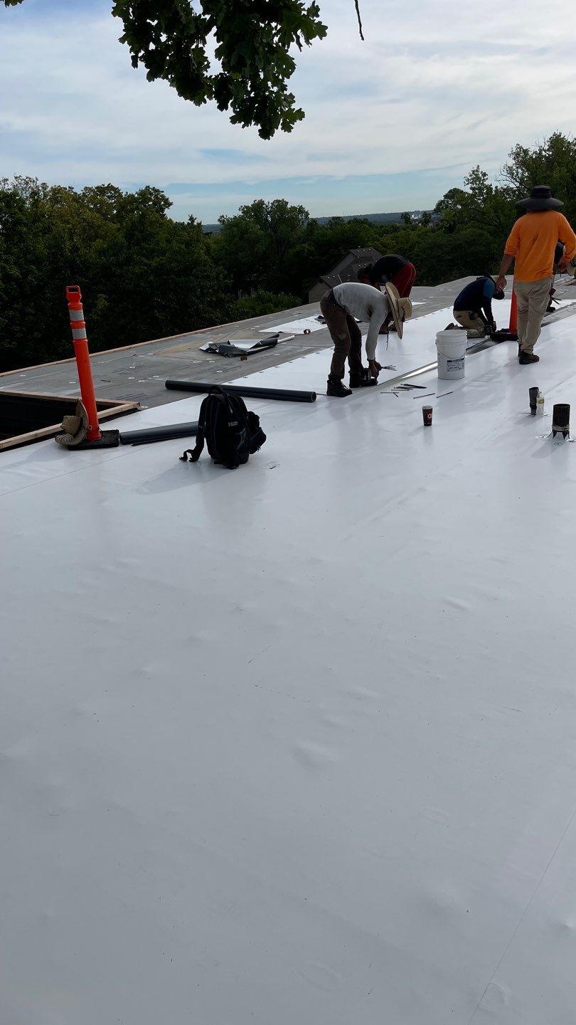 Commercial Flat Roofing System - PVC Membrane & Fluid Applied Coatings  by Titan Commercial & Residential Roofing 